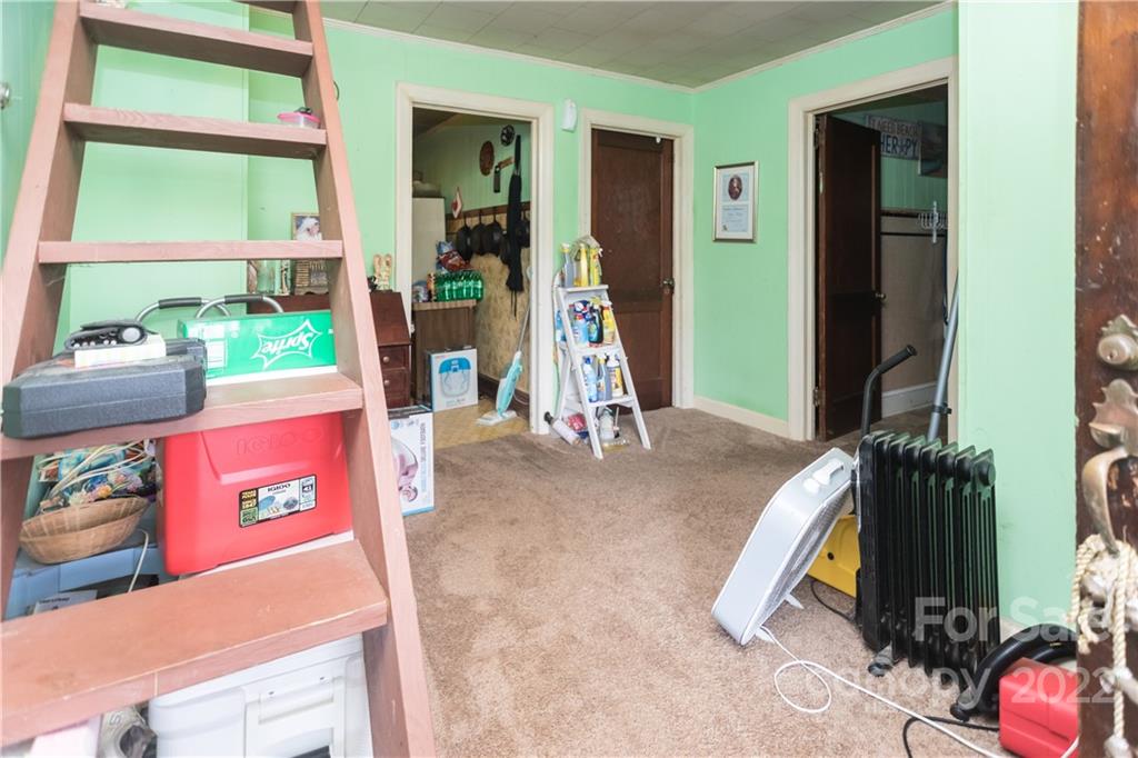 14925 North Old Statesville Road Huntersville, NC 28078 - Photo 7 of 18 a view of a room with gym equipment