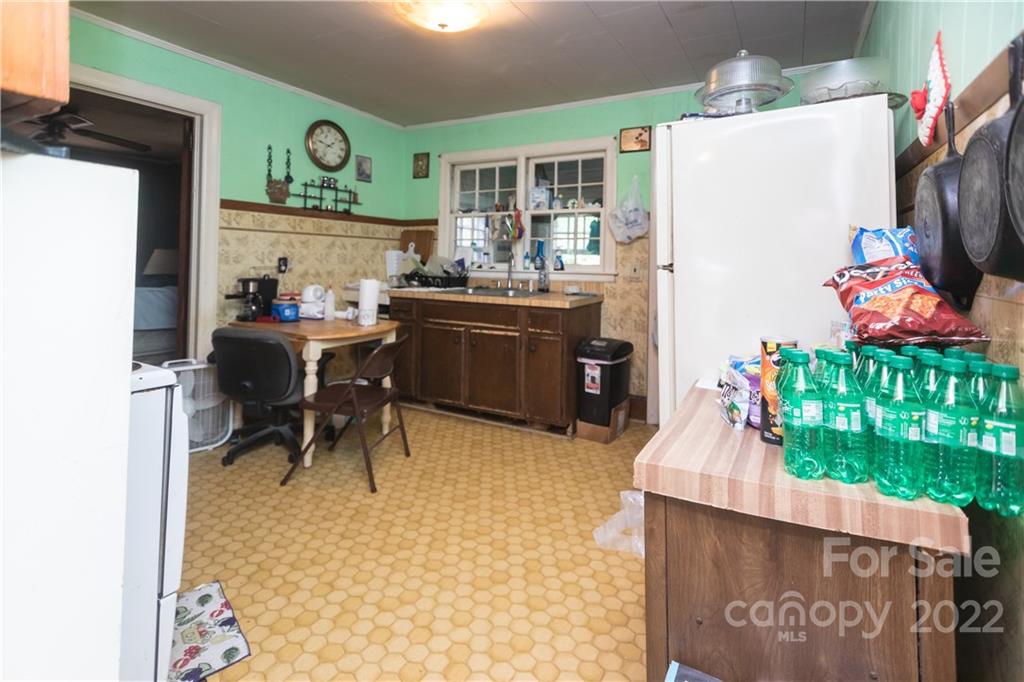 14925 North Old Statesville Road Huntersville, NC 28078 - Photo 8 of 18 a kitchen with a refrigerator and a table