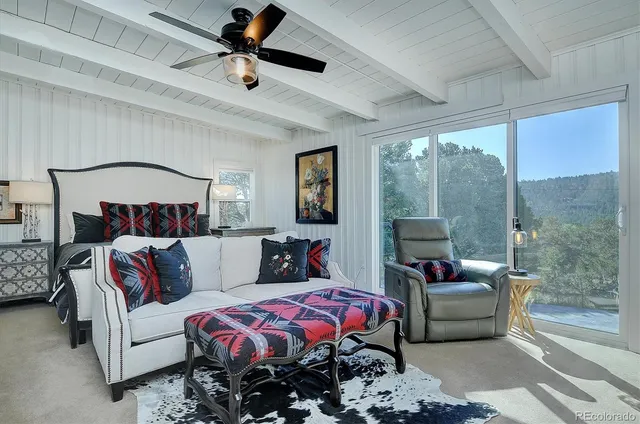 a bedroom with furniture and a couch