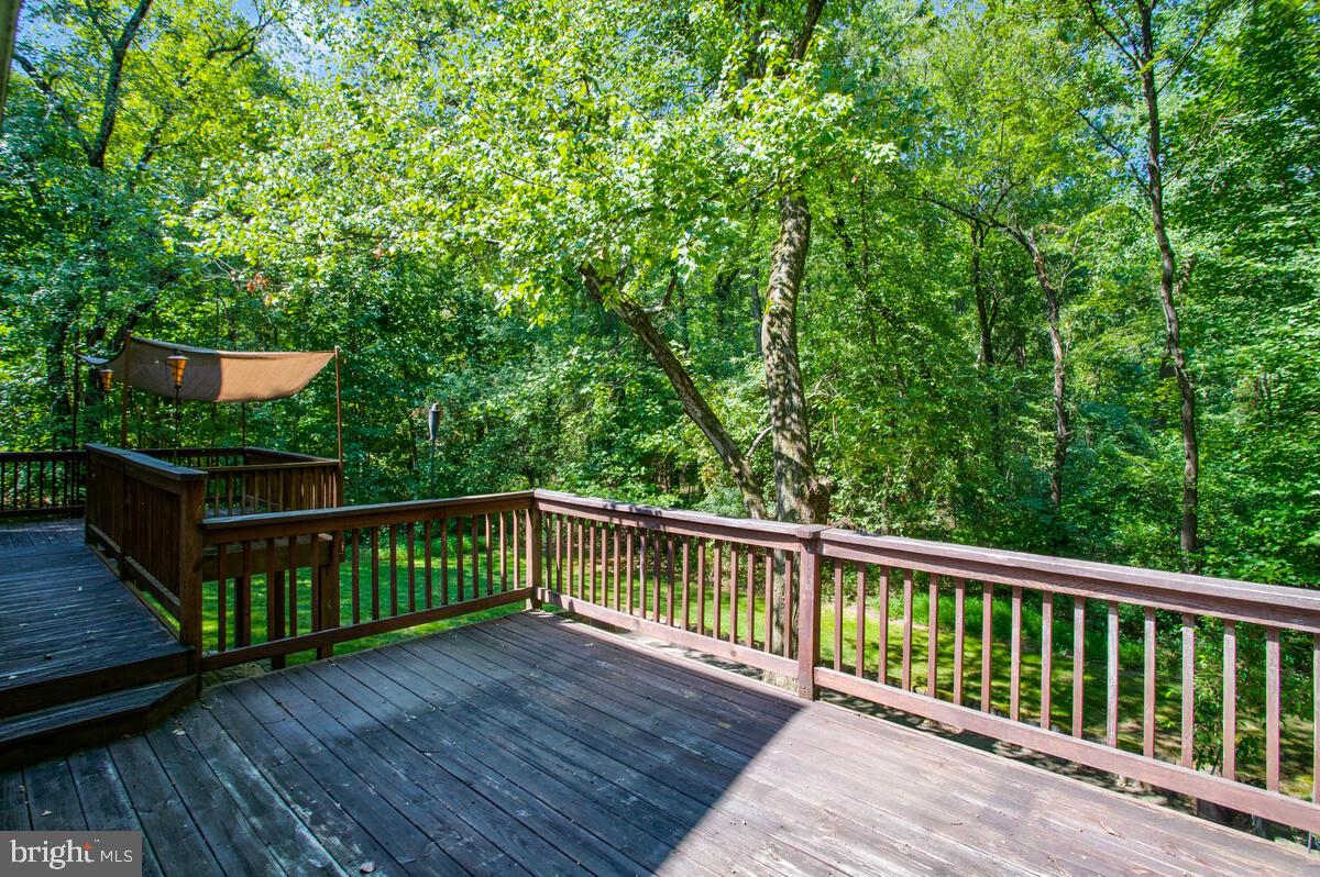 1755 Maple Avenue Hanover, MD 21076 - Photo 37 of 42 Enjoy the wooded view from the deck