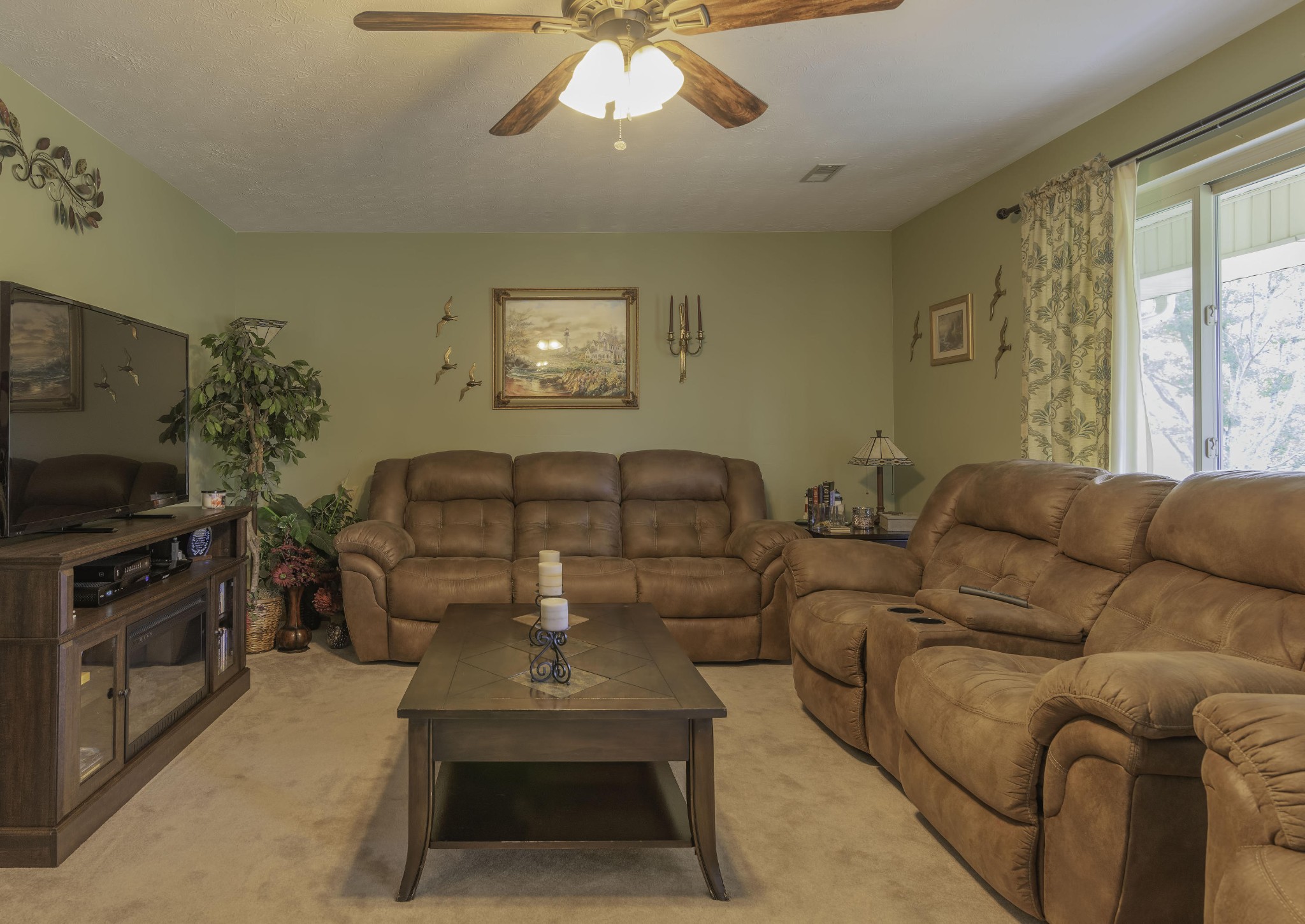 282 Little Tater Valley Road Luttrell, TN 37779 - Photo 5 of 26 a living room with furniture and a flat screen tv