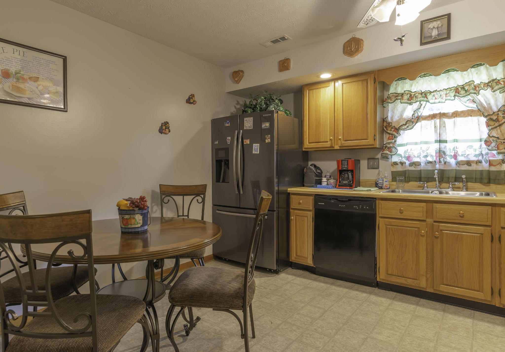 282 Little Tater Valley Road Luttrell, TN 37779 - Photo 8 of 26 a kitchen with a dining table and chairs
