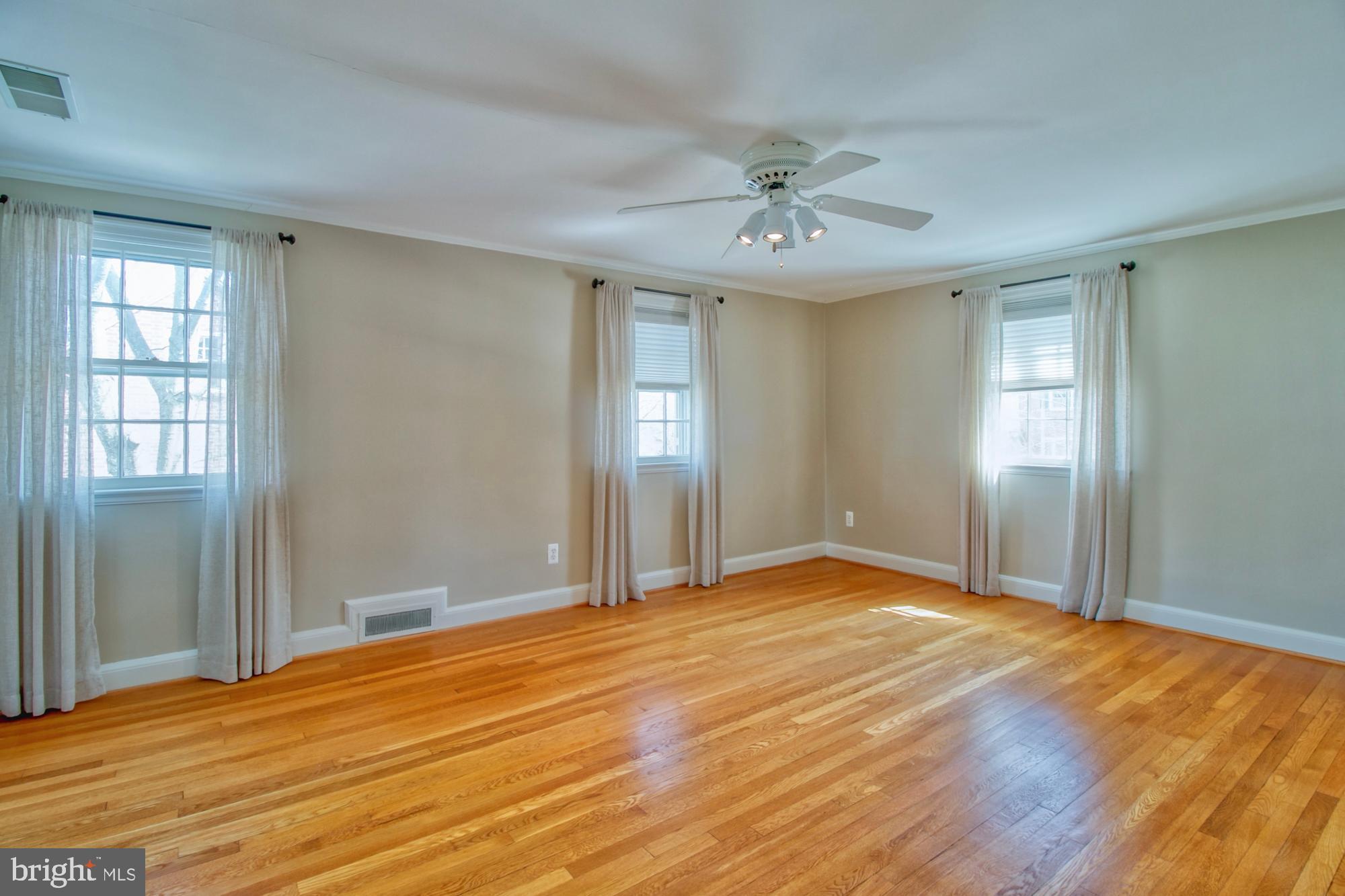 516 Yarmouth Road Baltimore, MD 21286 - Photo 24 of 50 Primary bedroom with HW floors and ceiling fan