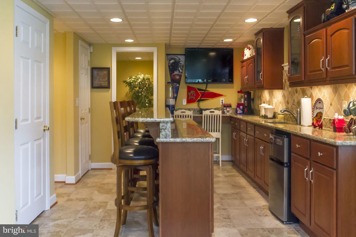17163 Fairfield Road Stewartstown, PA 17363 - Photo 50 of 90 And this bar/entertainment kitchen is attached.
