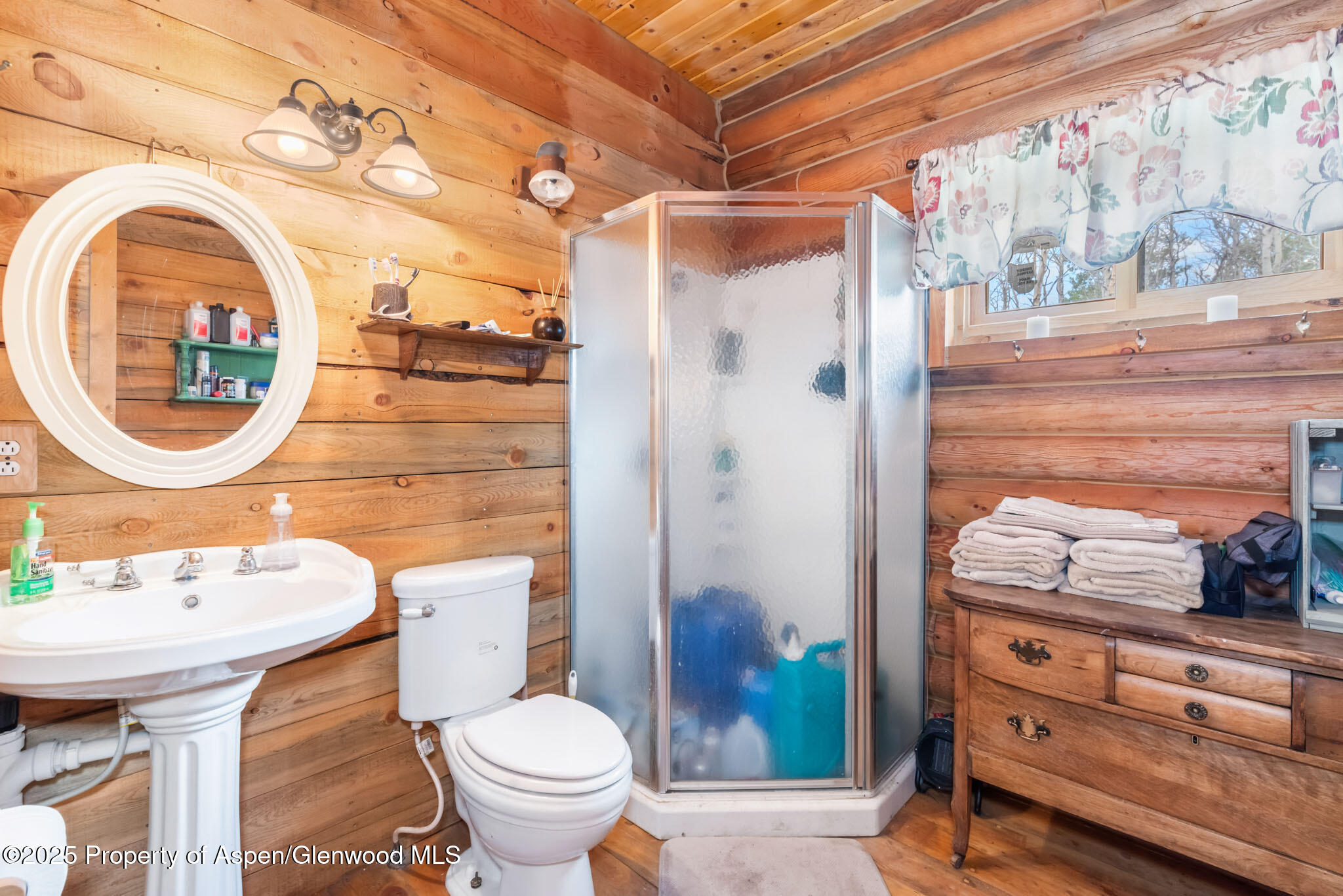 943 Routt Forest Drive Craig, CO 81625 - Photo 30 of 120 a bathroom with a sink and a mirror