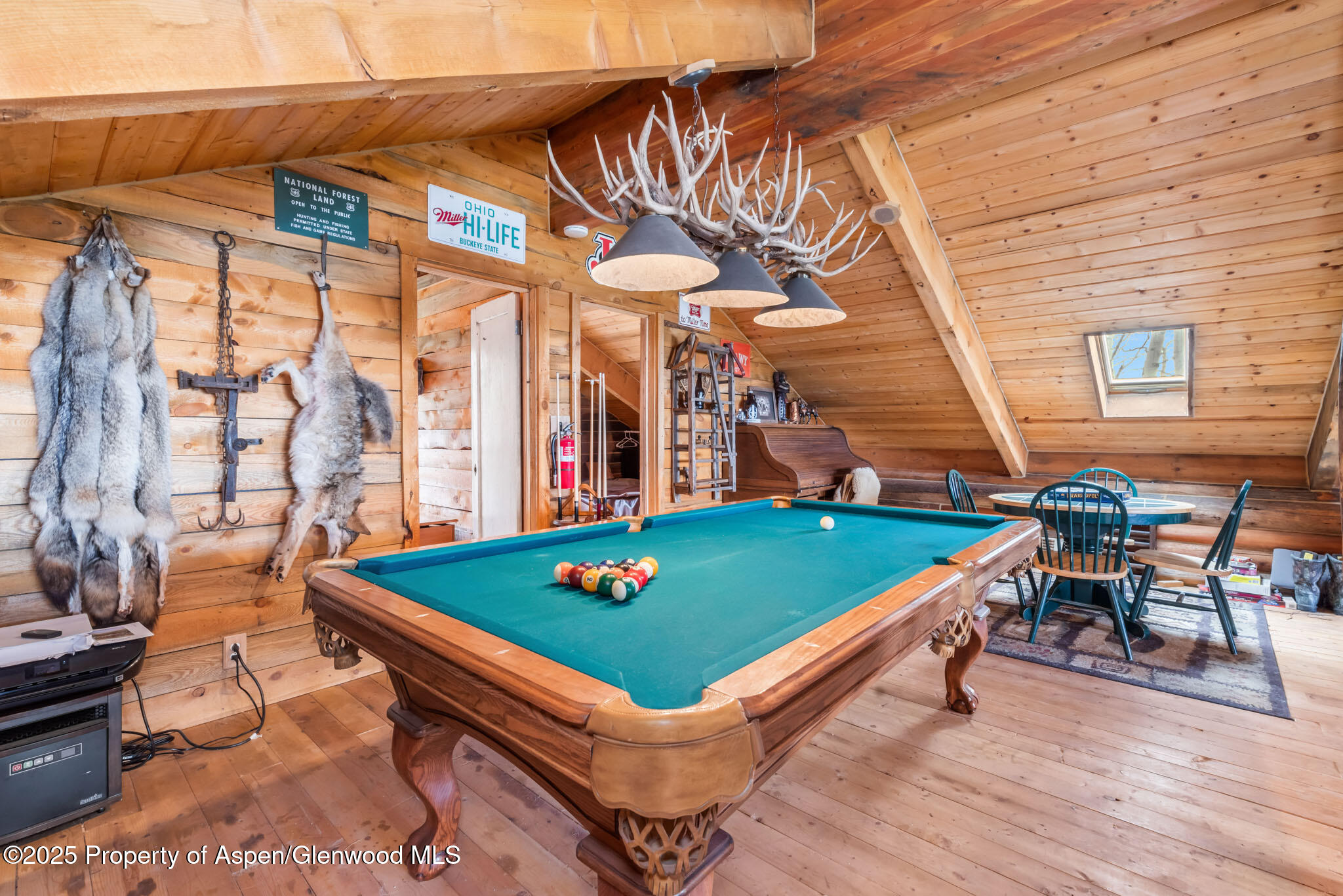 943 Routt Forest Drive Craig, CO 81625 - Photo 39 of 120 a room with chairs and table in it