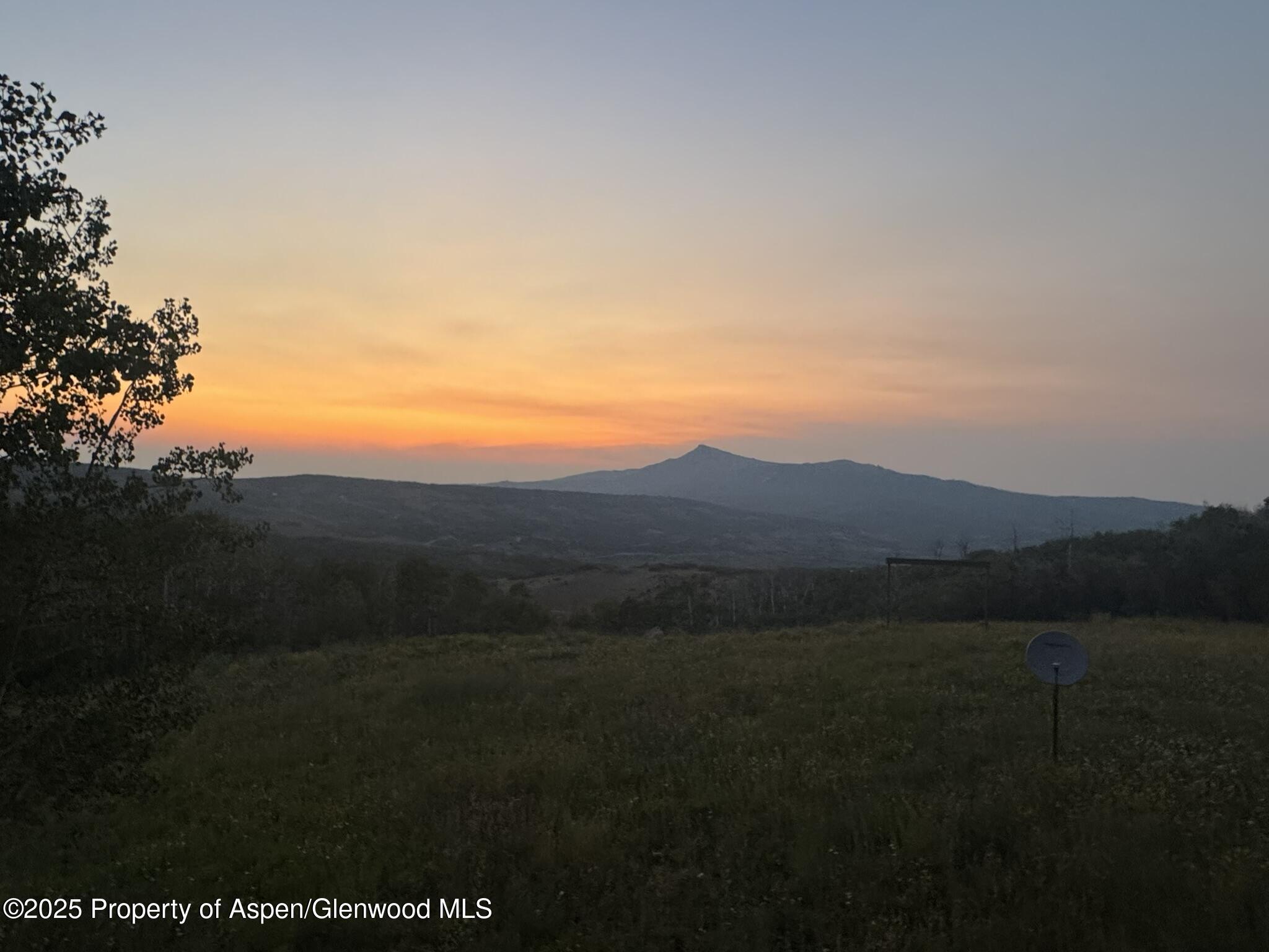 943 Routt Forest Drive Craig, CO 81625 - Photo 86 of 120 a view of an mountain and an outdoor seating