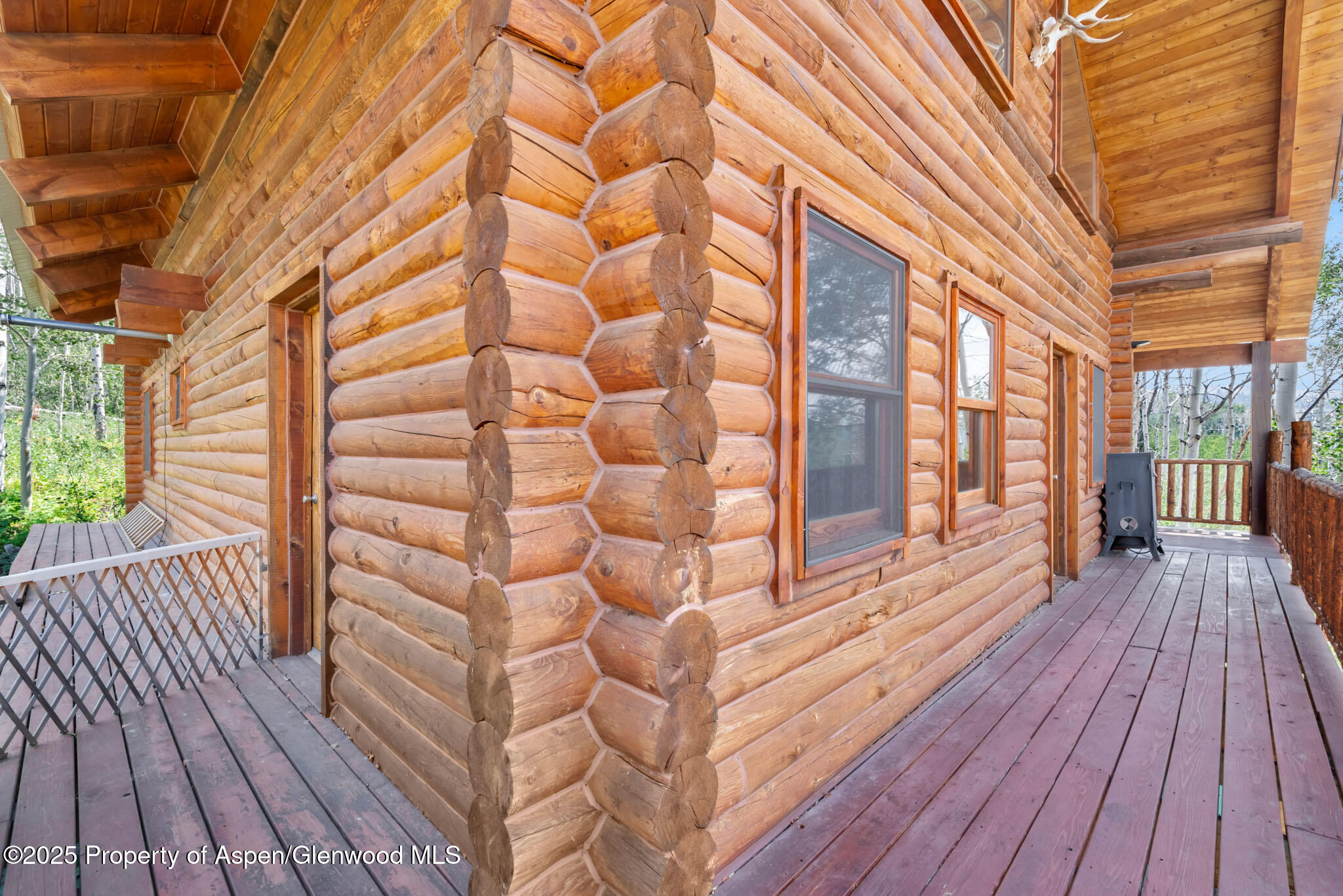 943 Routt Forest Drive Craig, CO 81625 - Photo 9 of 120 a view of outdoor space with wooden floor and city view