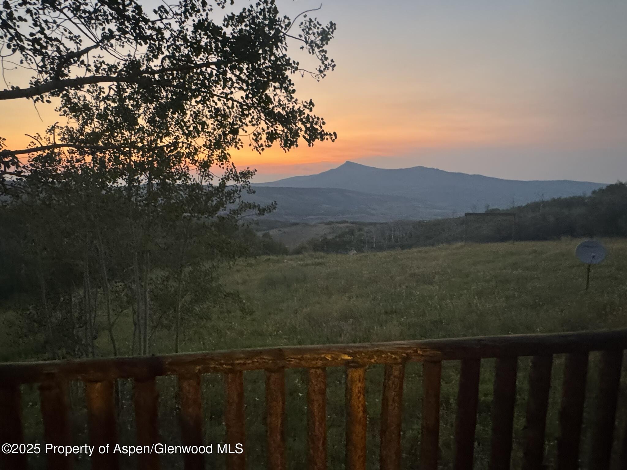 943 Routt Forest Drive Craig, CO 81625 - Photo 94 of 120 a view of a lake with a mountain in the background