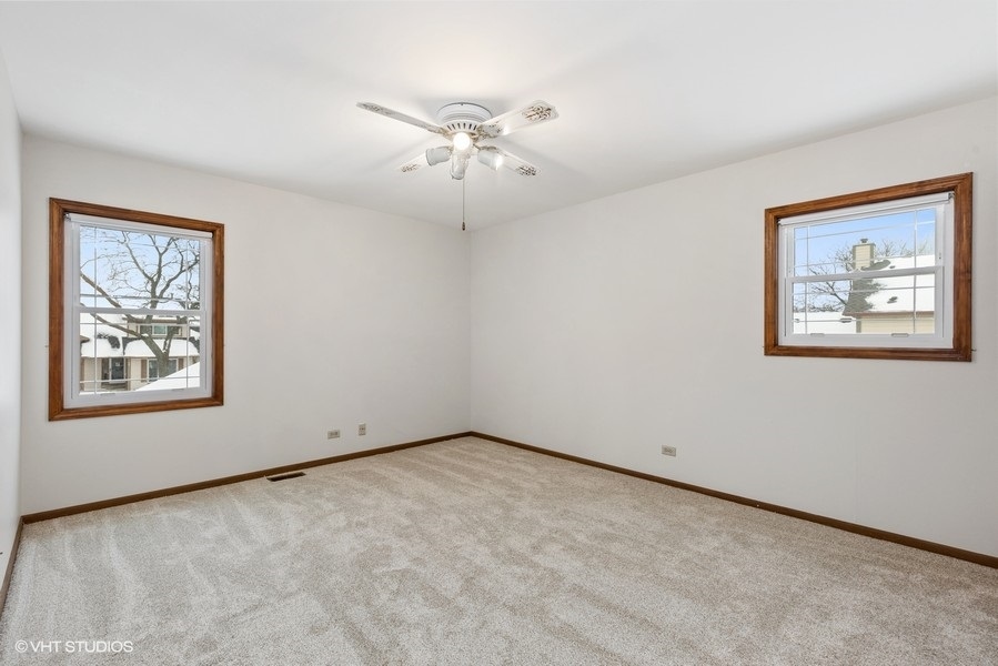 1310 Chatsworth Lane Hoffman Estates, IL 60169 - Photo 13 of 18 a view of an empty room with a window
