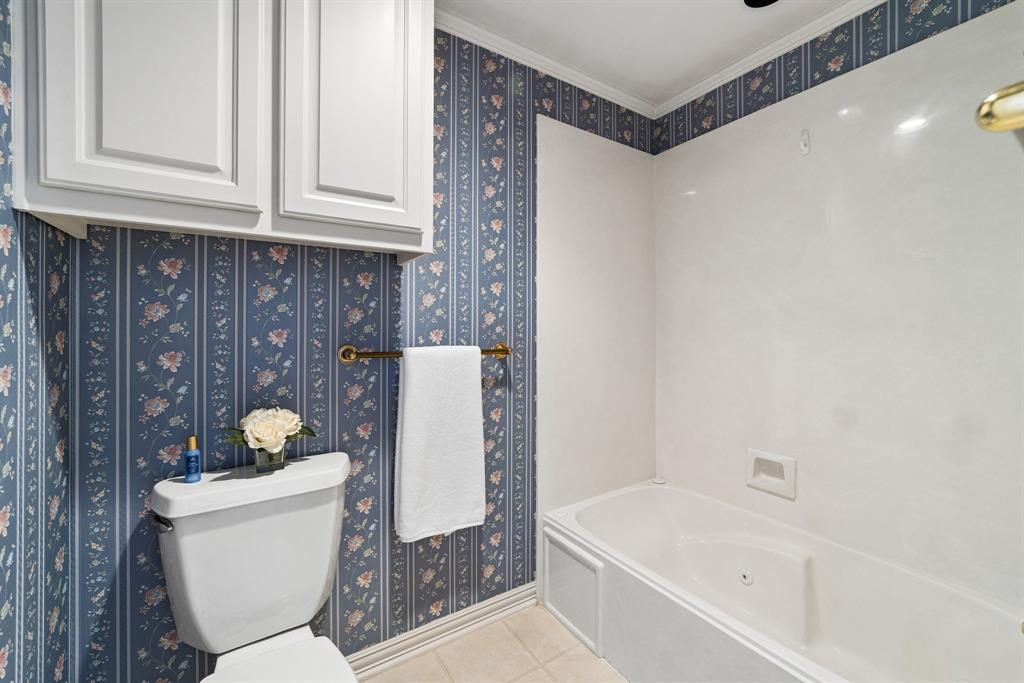 1175 Bloom Street Lucas, TX 75002 - Photo 24 of 36 a bathroom with a toilet and a bathtub