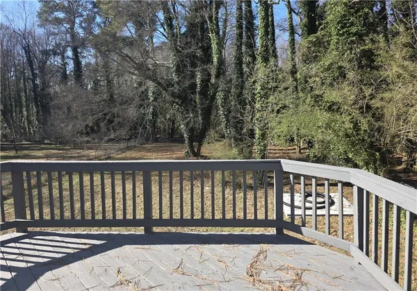 a porch with wooden floor