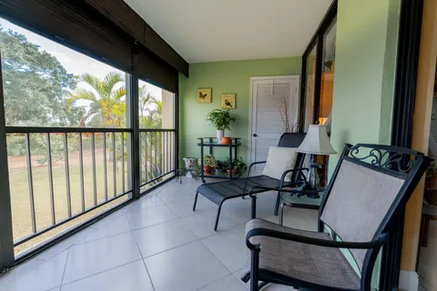 $349,900 | 5390 Woodland Lakes Drive, Unit 201, Palm Beach Gardens, FL 33418