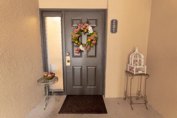 a view of entryway with wooden floor