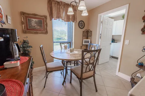 $349,900 | 5390 Woodland Lakes Drive, Unit 201, Palm Beach Gardens, FL 33418