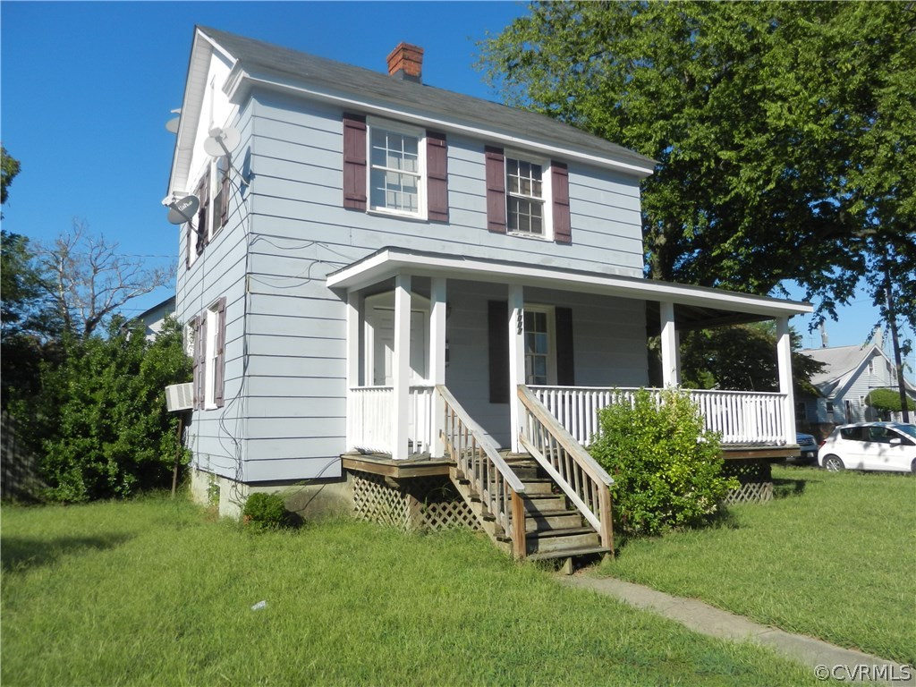 1007 Burnside Street Hopewell, VA 23860 - Photo 1 of 19 a view of a house with a yard