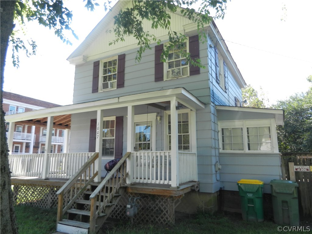 1007 Burnside Street Hopewell, VA 23860 - Photo 2 of 19 a view of a house with a window and wooden fence