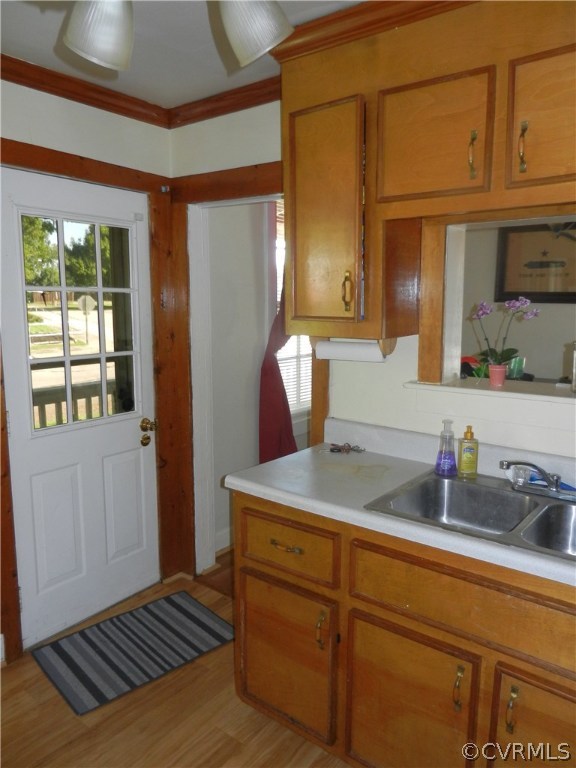 1007 Burnside Street Hopewell, VA 23860 - Photo 4 of 19 a kitchen with a sink cabinets and window