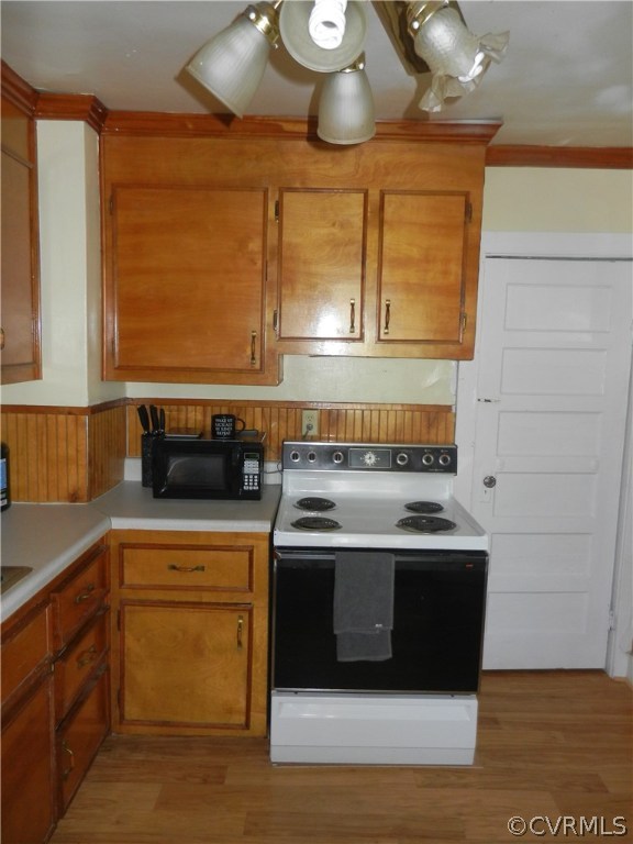 1007 Burnside Street Hopewell, VA 23860 - Photo 5 of 19 a kitchen with a stove and a sink