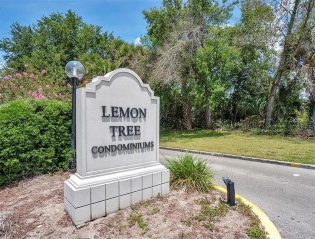 2526 Lemon Tree Lane, Unit L Orlando, FL 32839 - Photo 16 of 16 a sign on the side of the road