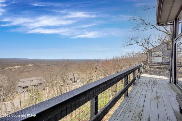 a view of wooden floor with a ocean view