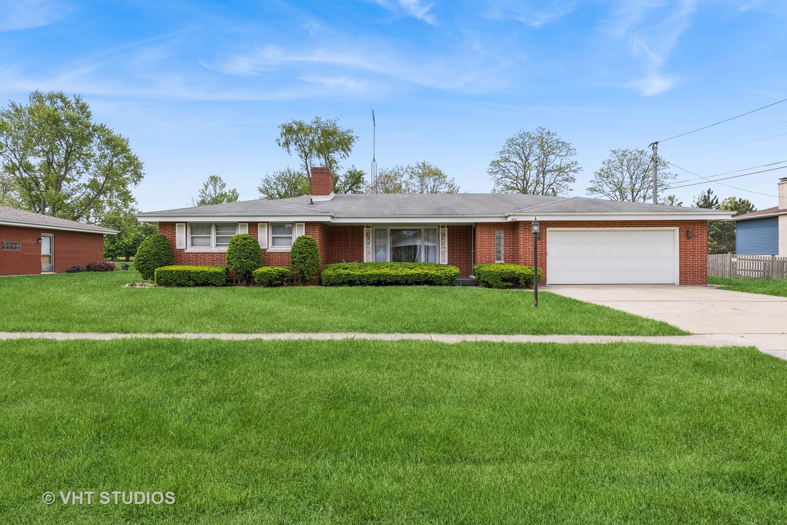 452 Miller Street Beecher, IL 60401 - Photo 1 of 20 a front view of a house with a yard