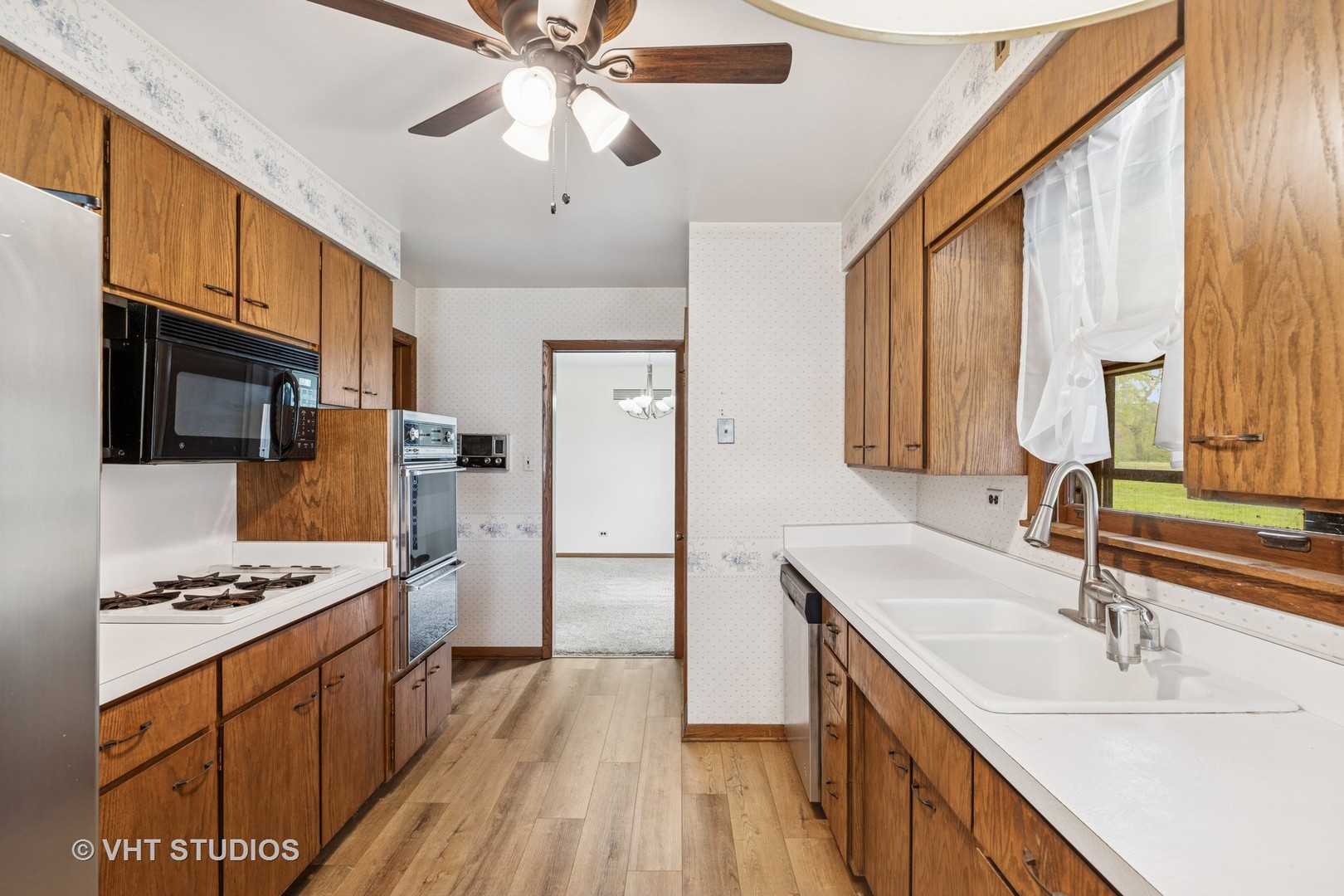 452 Miller Street Beecher, IL 60401 - Photo 5 of 20 a kitchen with stainless steel appliances granite countertop a sink stove cabinets and refrigerator