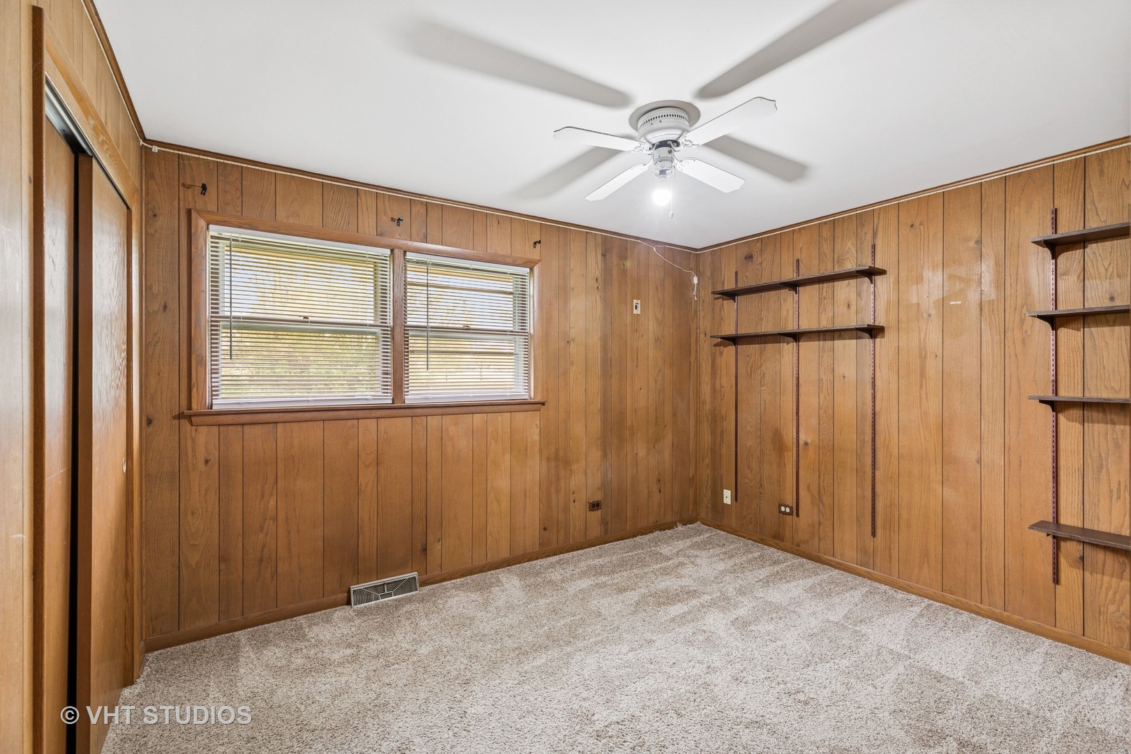 452 Miller Street Beecher, IL 60401 - Photo 6 of 20 a view of an empty room with a window