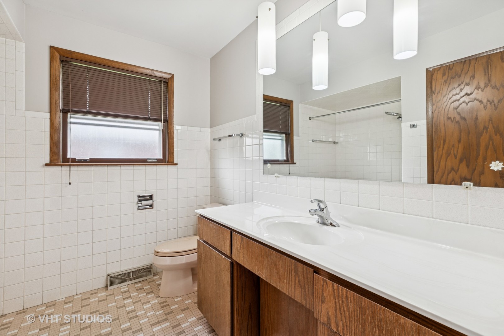 452 Miller Street Beecher, IL 60401 - Photo 9 of 20 a bathroom with a sink toilet and mirror
