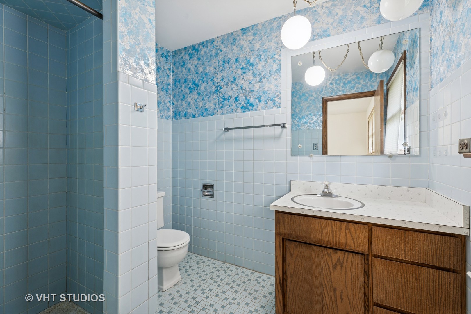 452 Miller Street Beecher, IL 60401 - Photo 10 of 20 a bathroom with a sink a toilet and mirror