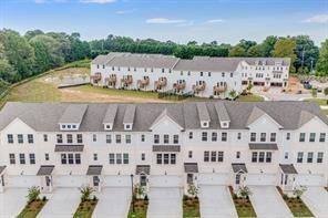 a view of building with outdoor space and seating area