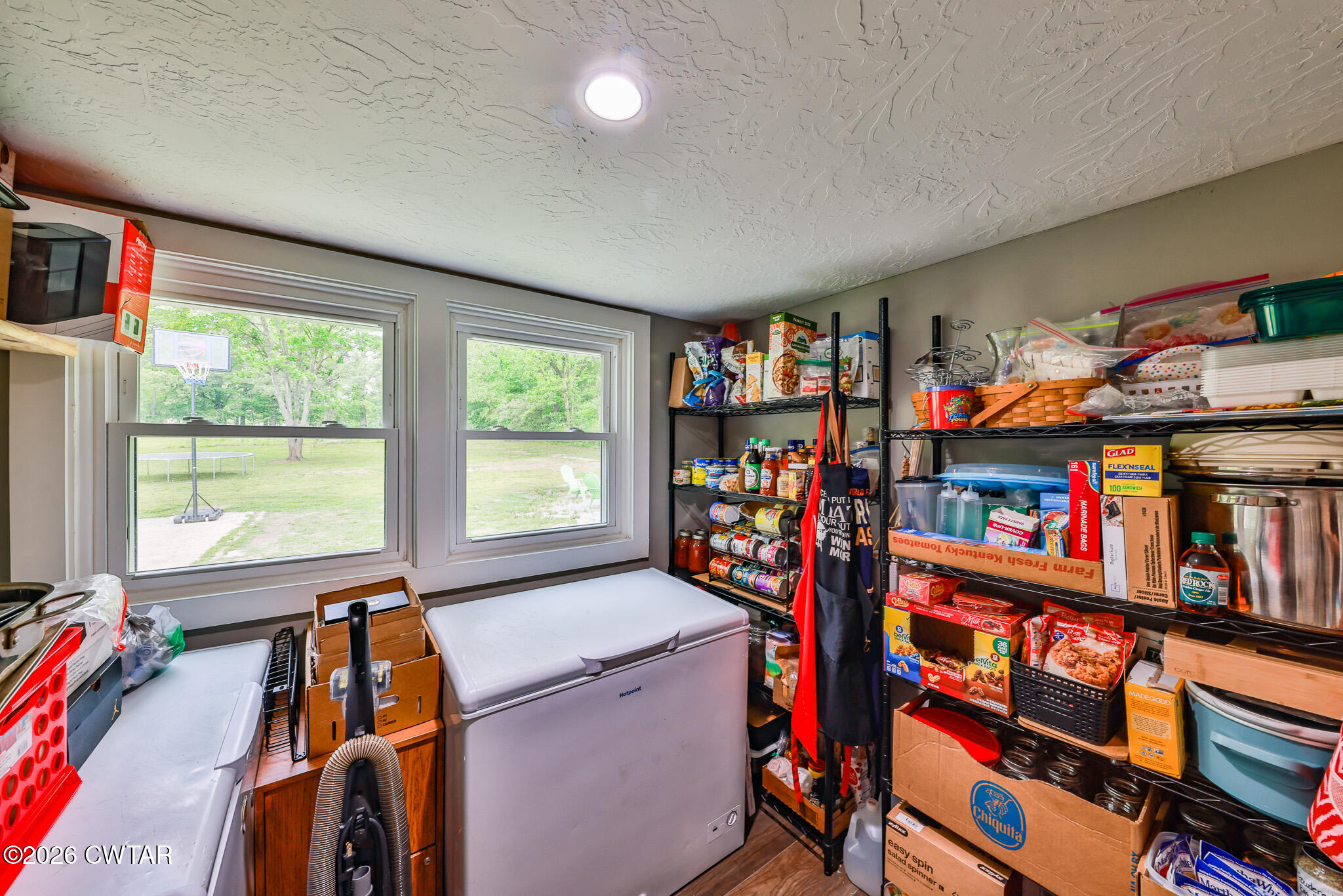 210 East Union Street Gleason, TN 38229 - Photo 20 of 28 a room with furniture and a book shelf