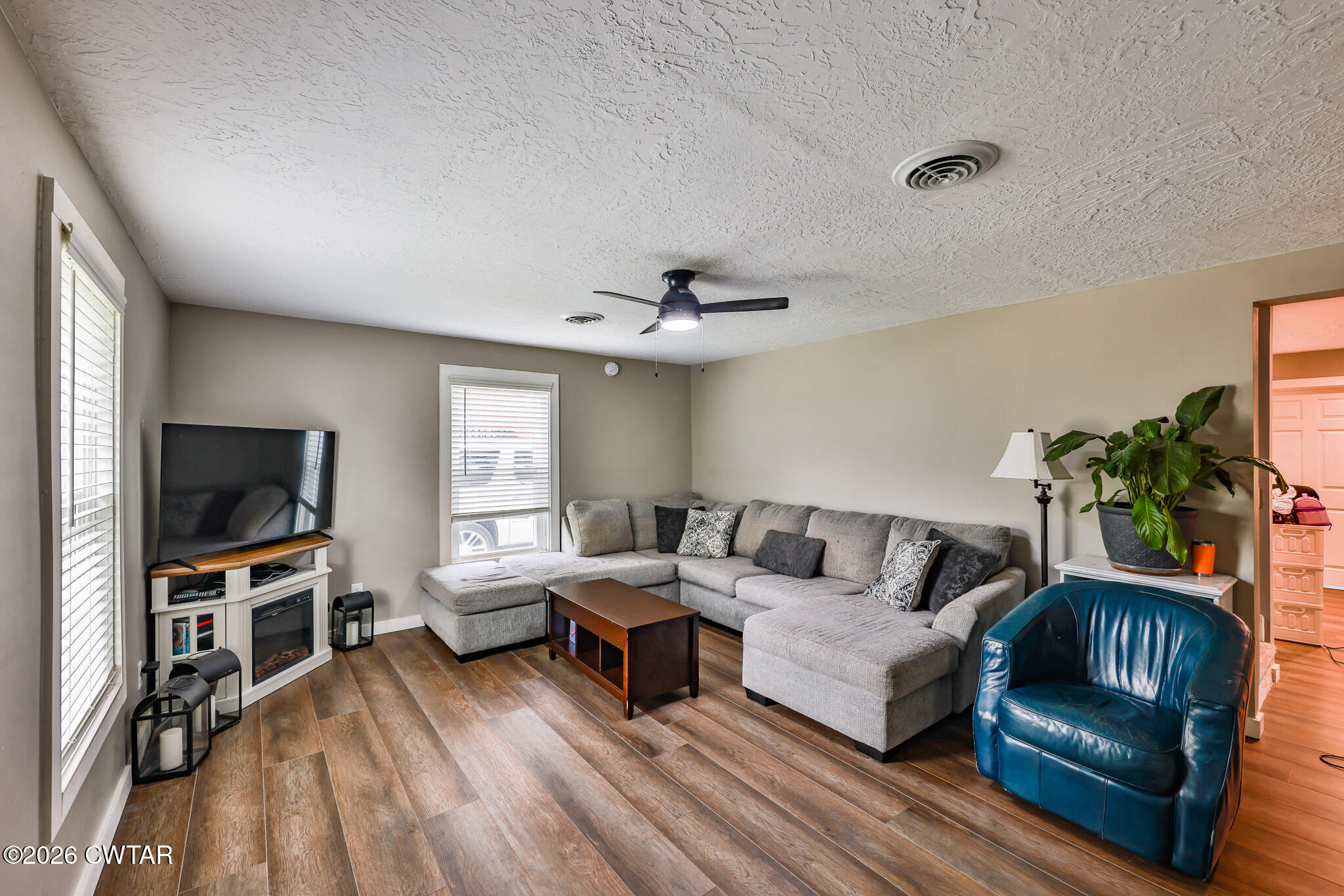 210 East Union Street Gleason, TN 38229 - Photo 6 of 28 a living room with furniture and a flat screen tv