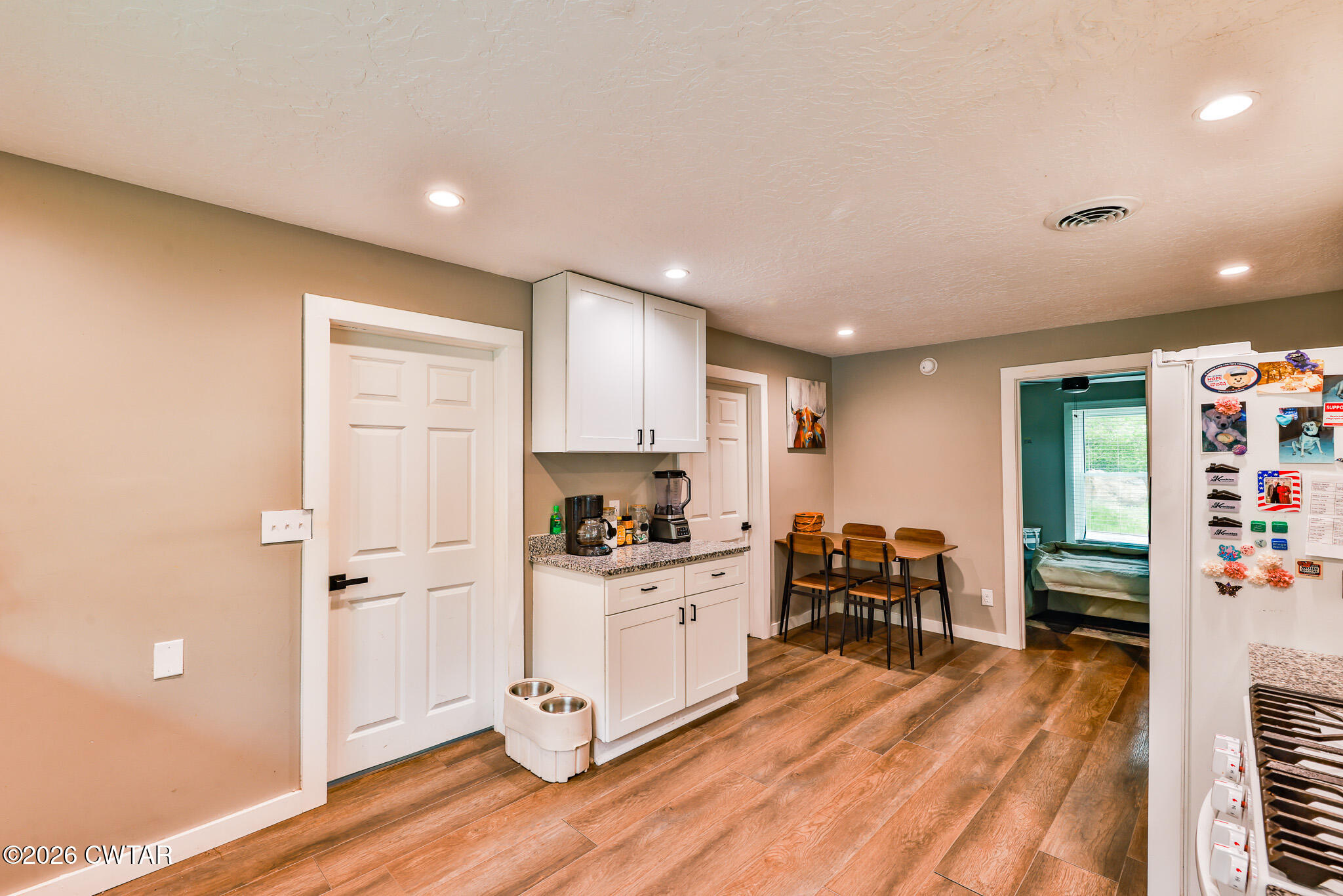210 East Union Street Gleason, TN 38229 - Photo 10 of 28 a kitchen with stainless steel appliances a refrigerator and a stove top oven