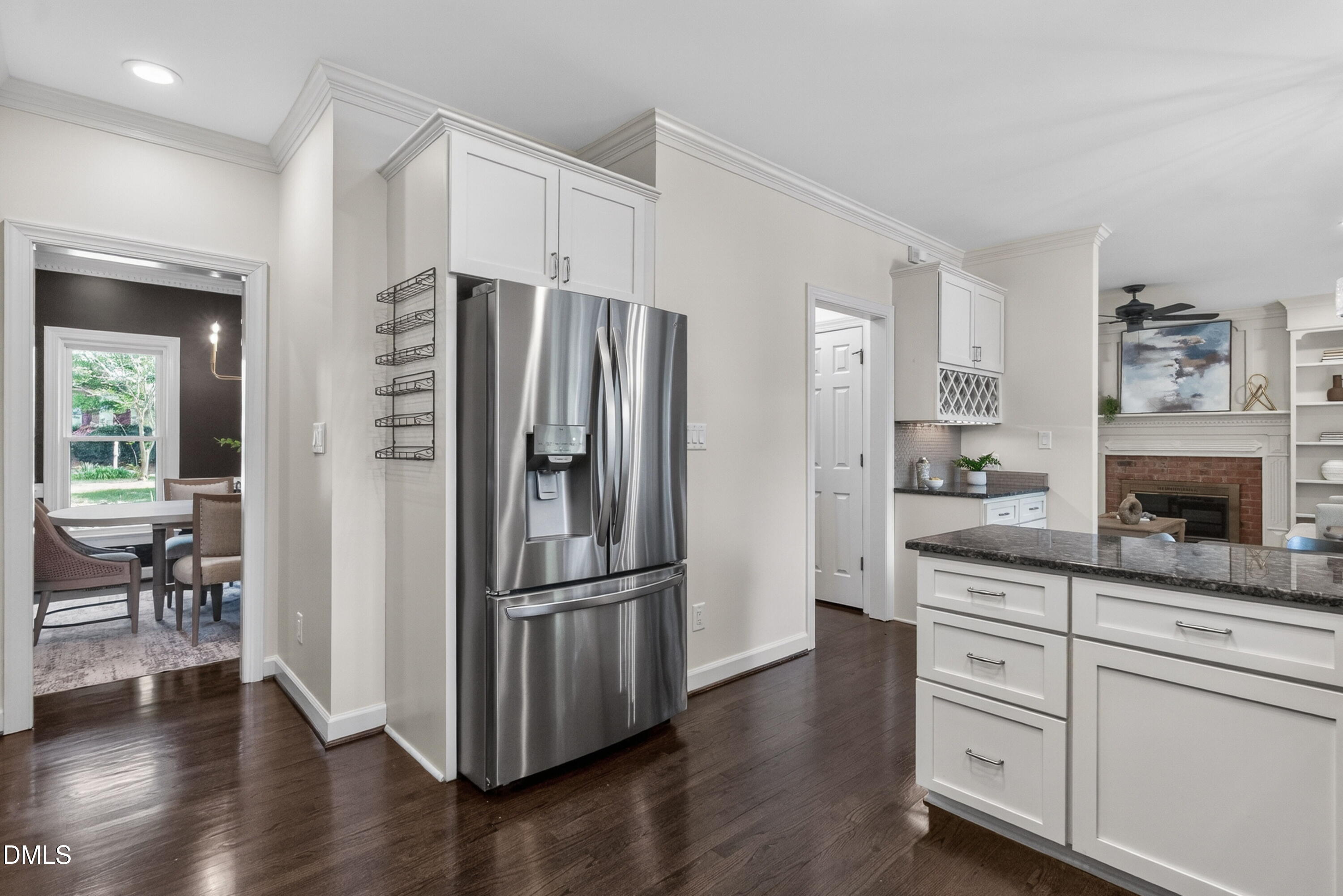 4021 Westwood Place Raleigh, NC 27613 - Photo 15 of 37 a kitchen with stainless steel appliances granite countertop a refrigerator and a stove top oven