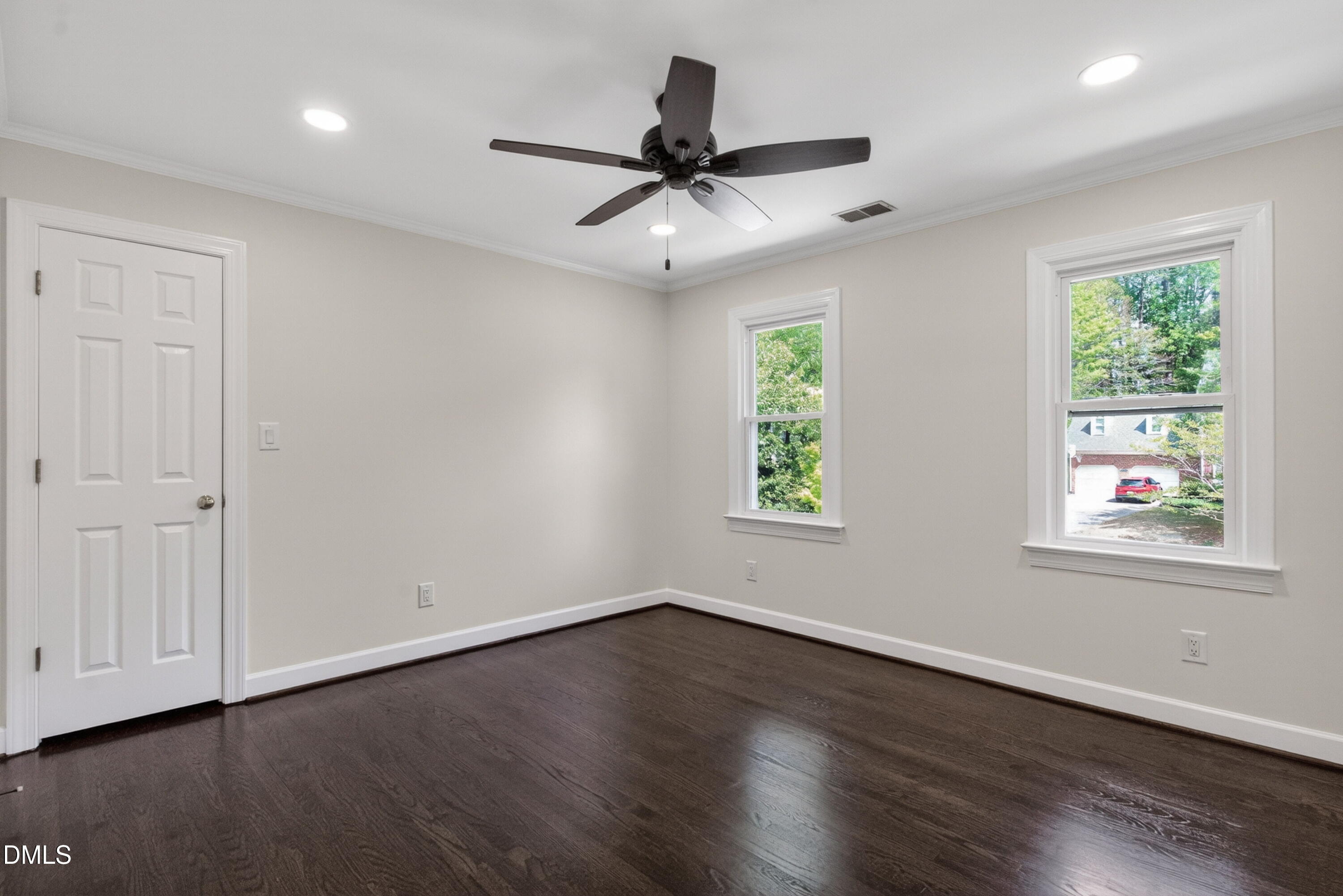 4021 Westwood Place Raleigh, NC 27613 - Photo 23 of 37 a view of an empty room with wooden floor and a window