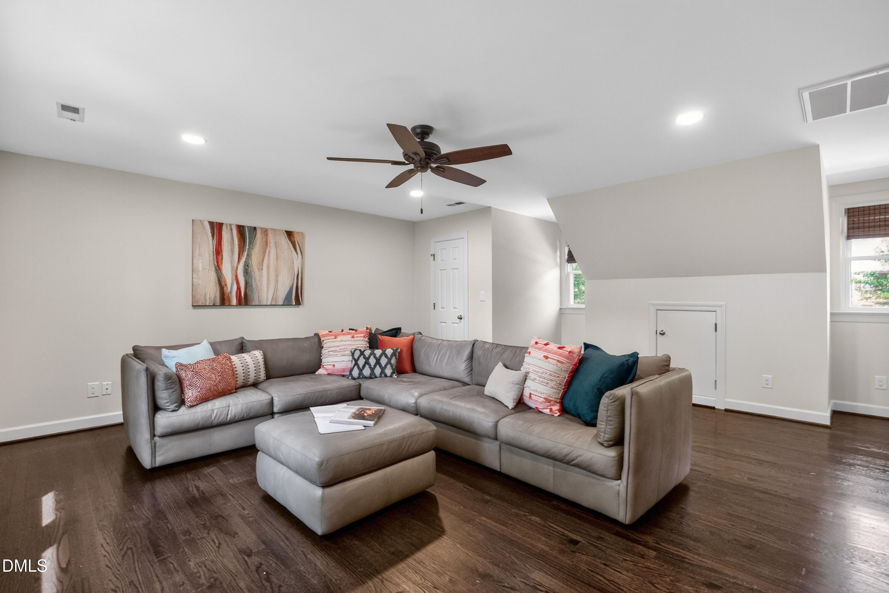 4021 Westwood Place Raleigh, NC 27613 - Photo 25 of 37 a living room with furniture and a ceiling fan