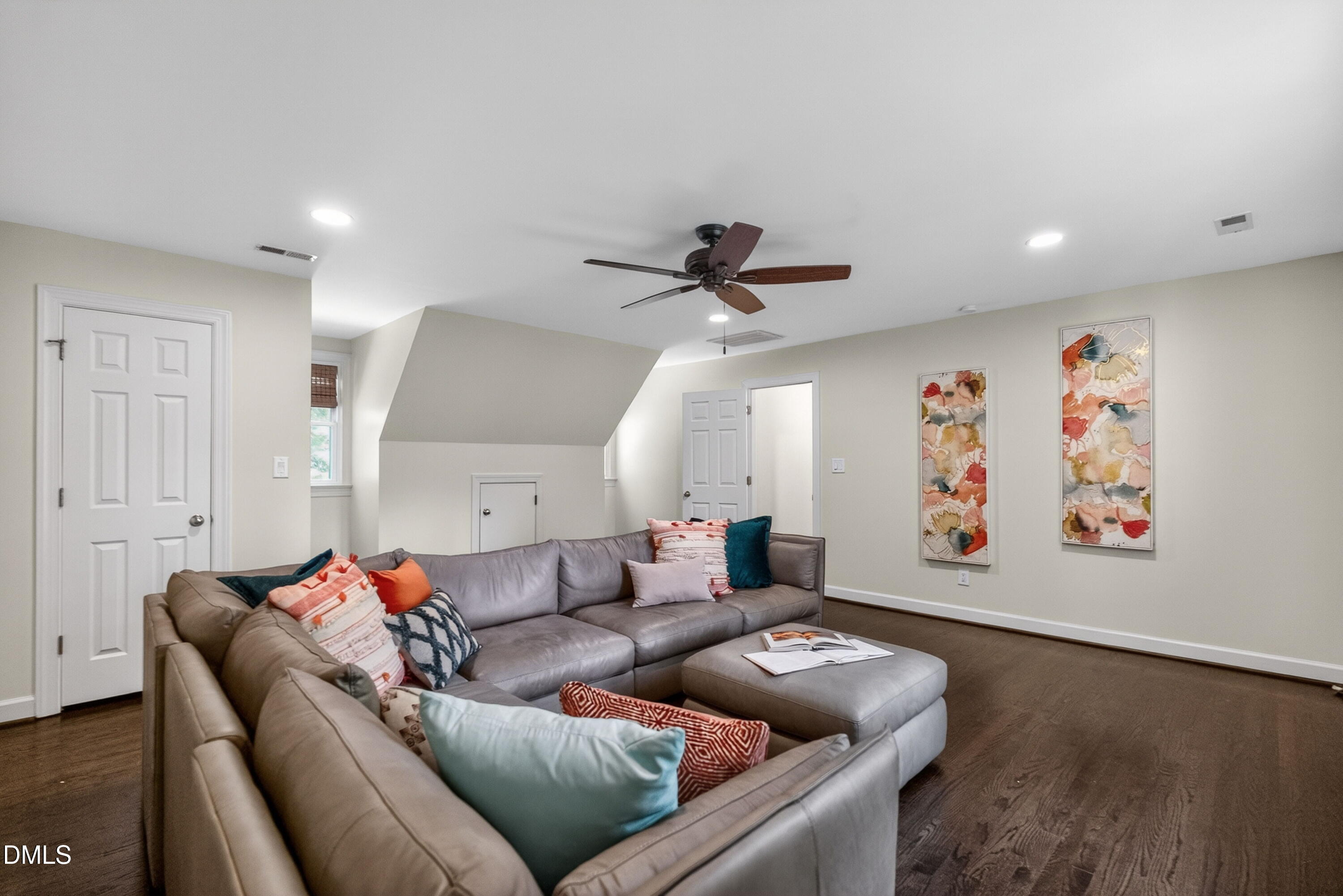 4021 Westwood Place Raleigh, NC 27613 - Photo 26 of 37 a living room with furniture and a wooden floor