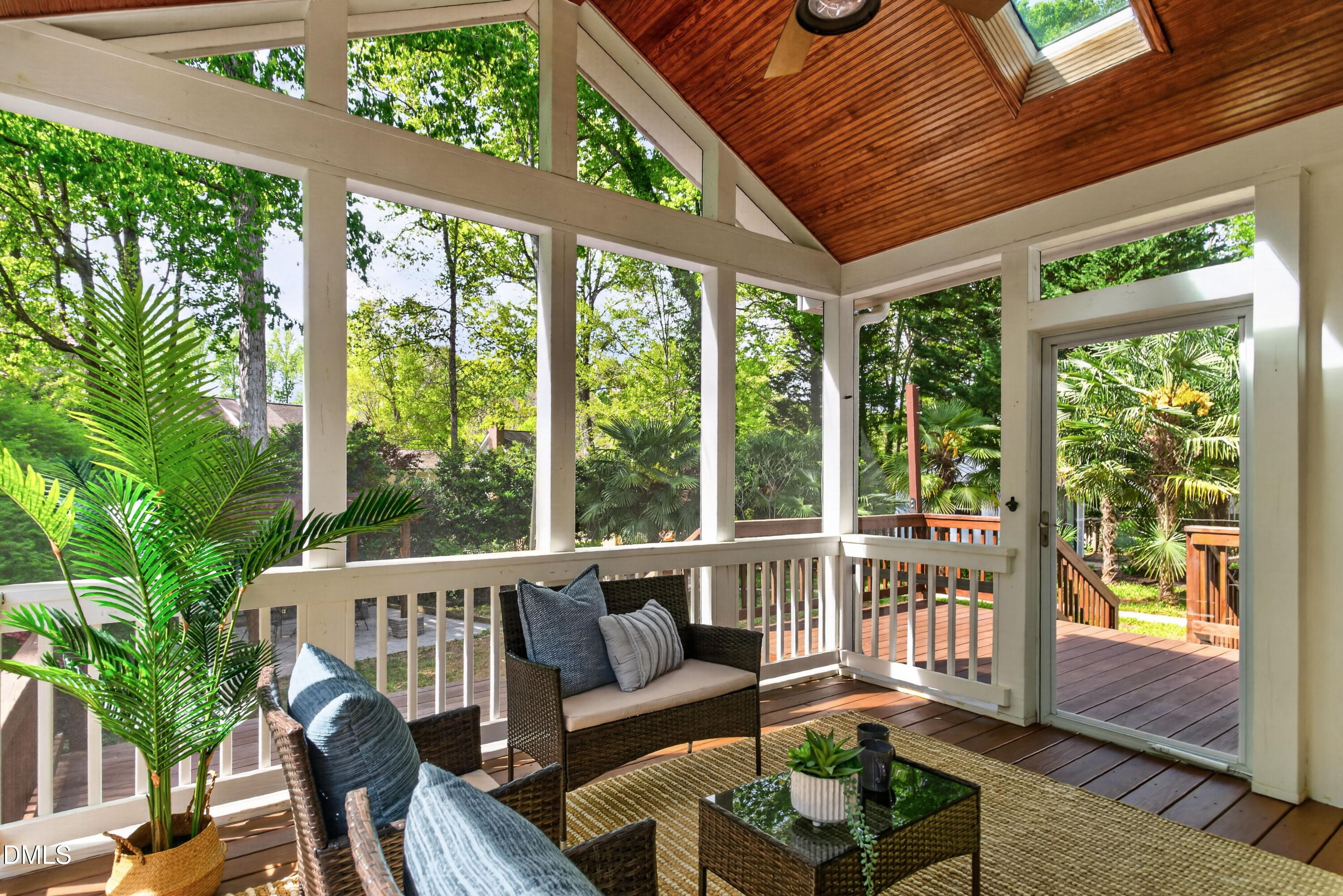 4021 Westwood Place Raleigh, NC 27613 - Photo 28 of 37 a balcony with wooden floor and outdoor seating