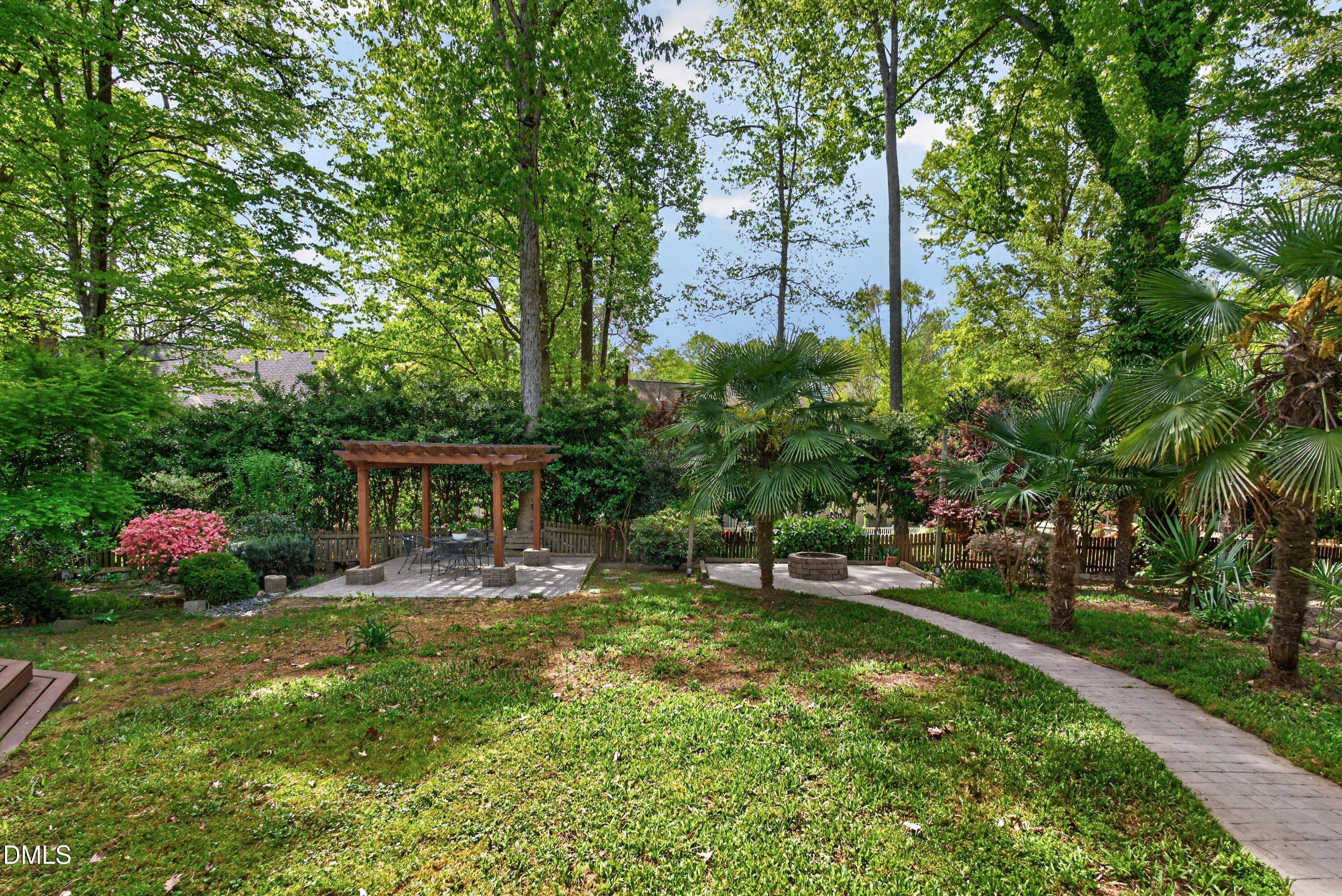 4021 Westwood Place Raleigh, NC 27613 - Photo 31 of 37 a front view of a house with garden