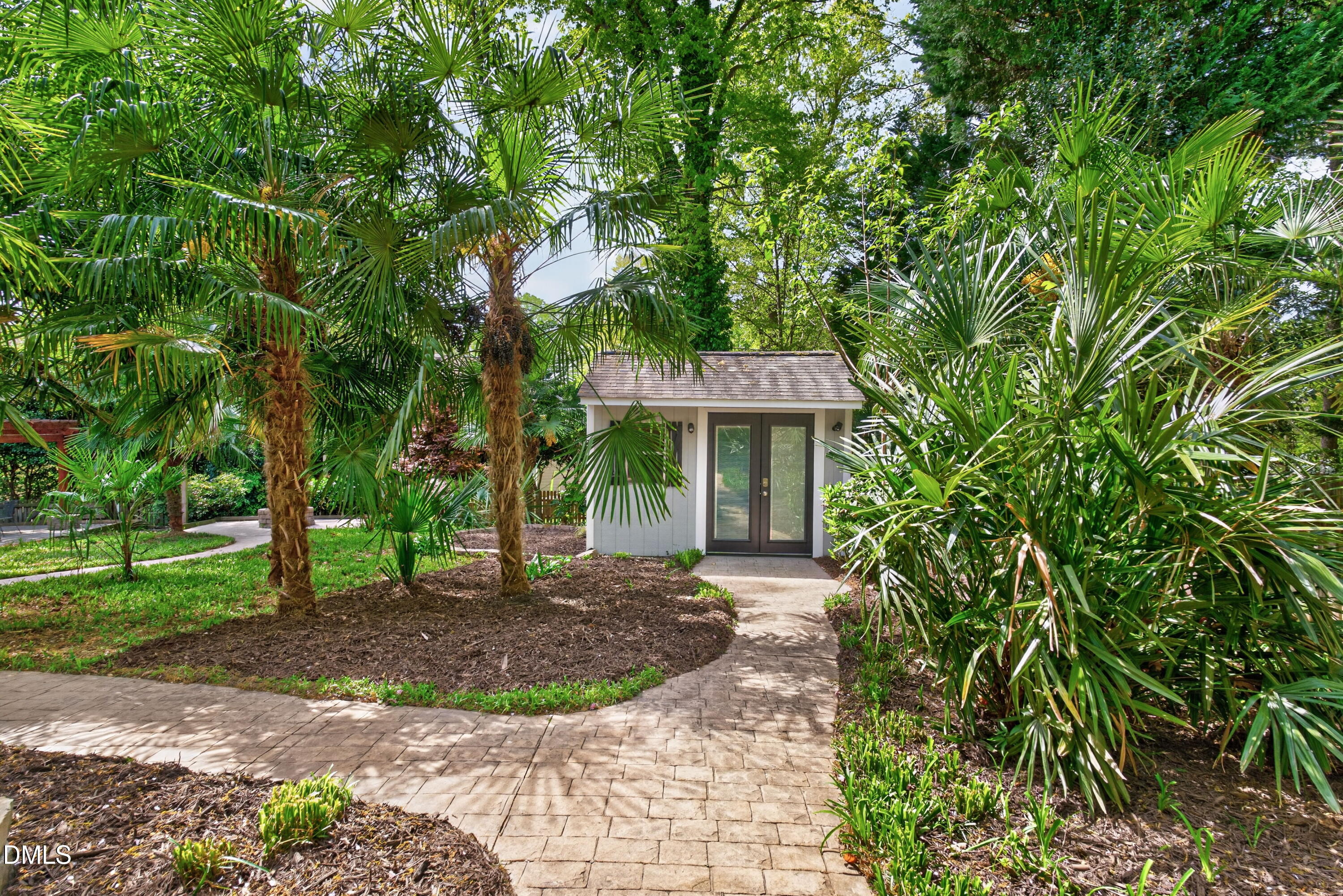 4021 Westwood Place Raleigh, NC 27613 - Photo 35 of 37 a front view of a house with a garden