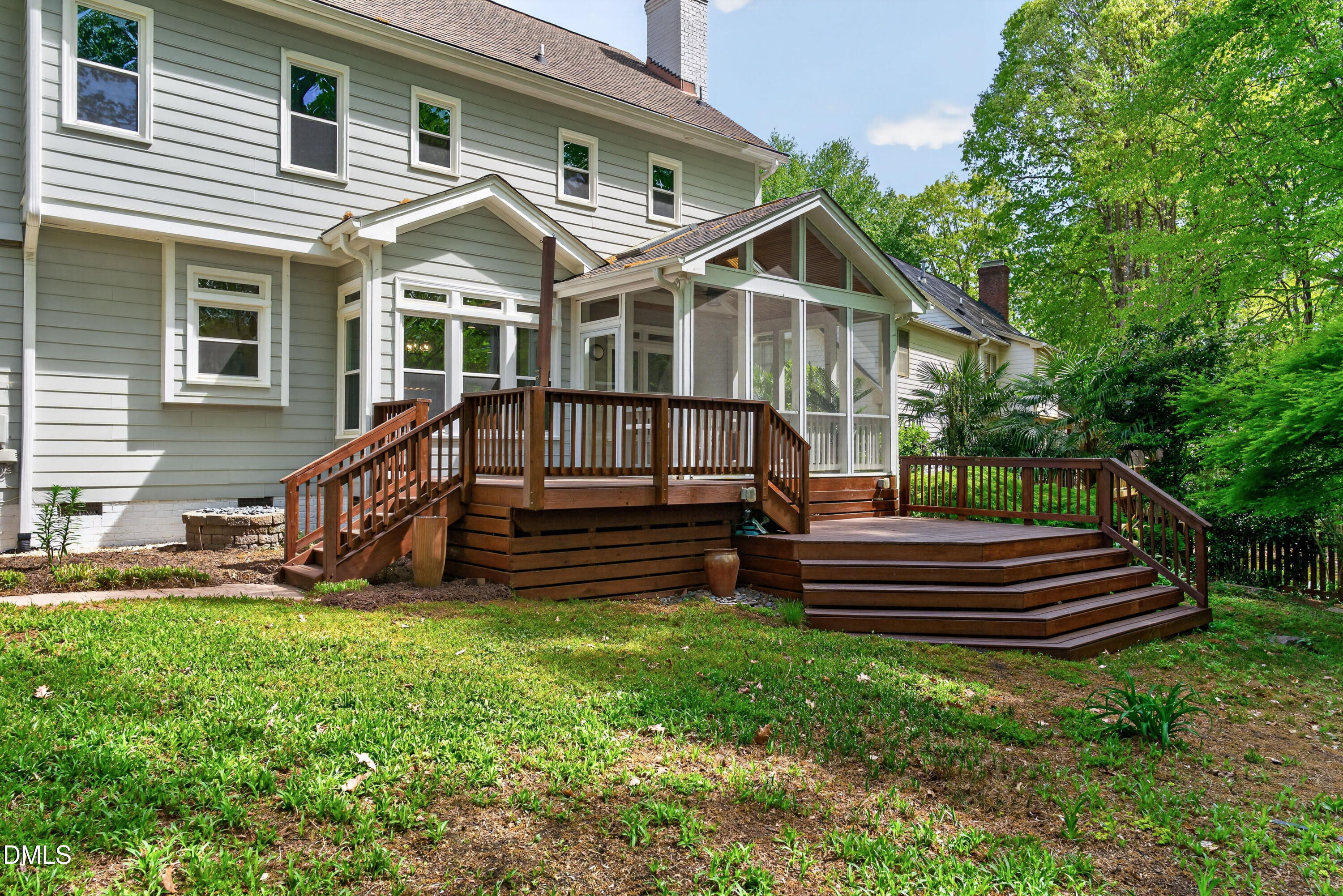 4021 Westwood Place Raleigh, NC 27613 - Photo 37 of 37 a front view of a house with garden and wooden fence