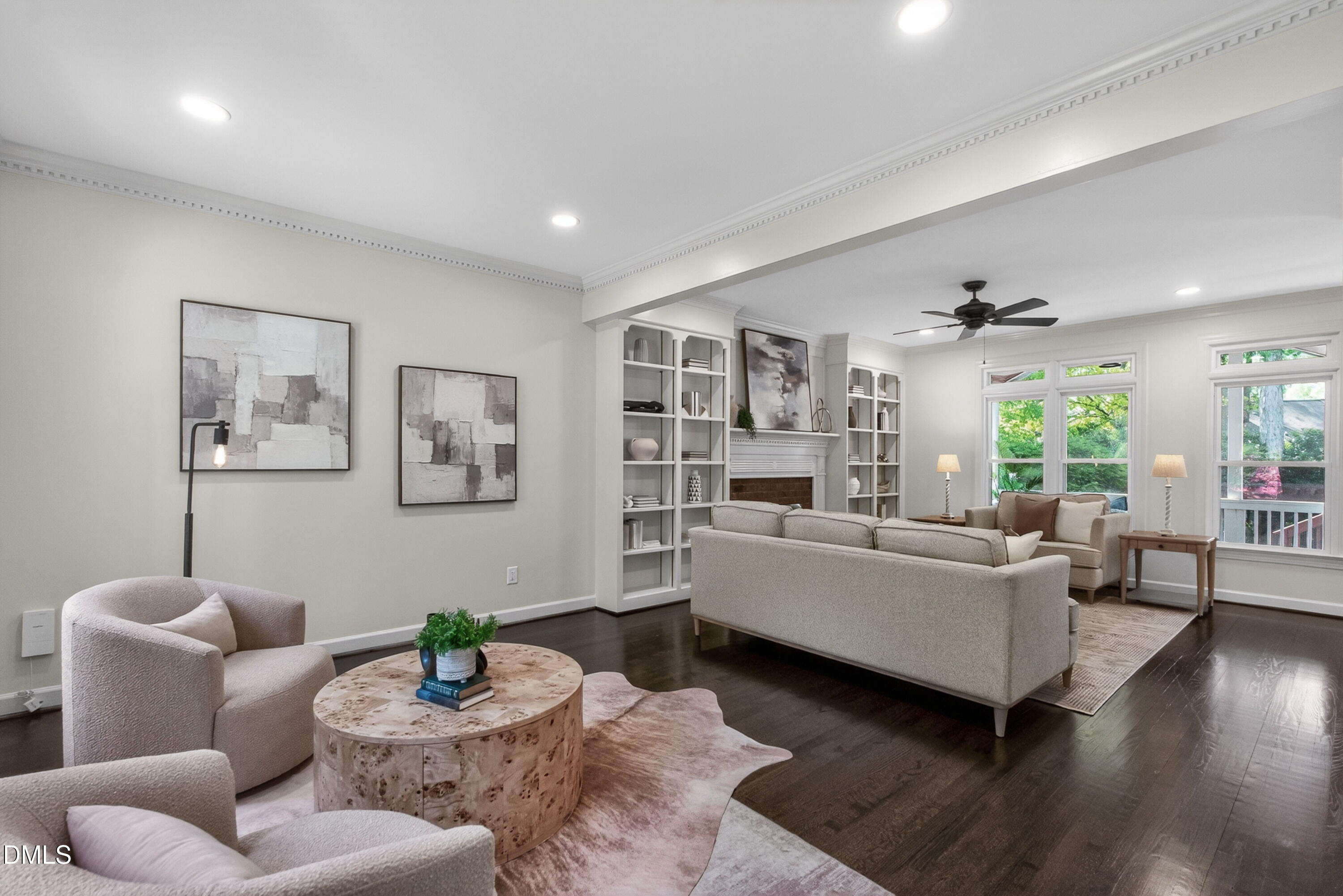 4021 Westwood Place Raleigh, NC 27613 - Photo 5 of 37 a living room with furniture and a wooden floor