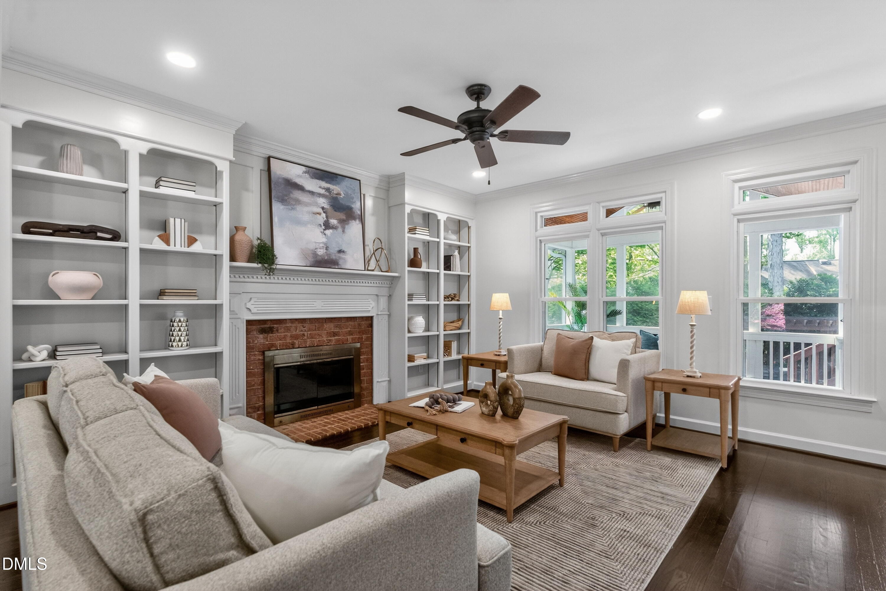 4021 Westwood Place Raleigh, NC 27613 - Photo 6 of 37 a living room with furniture and a fireplace
