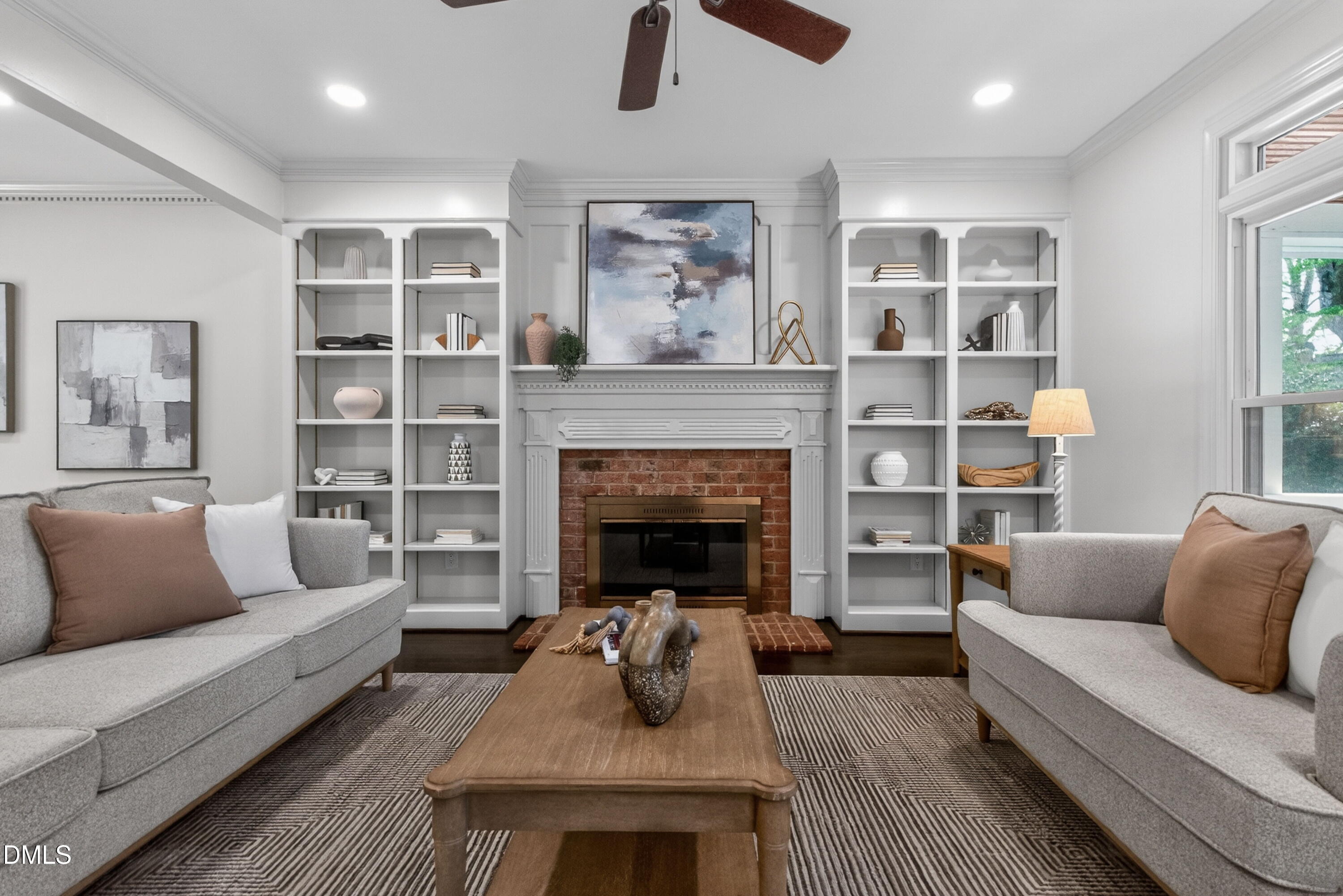 4021 Westwood Place Raleigh, NC 27613 - Photo 7 of 37 a living room with furniture and a fireplace