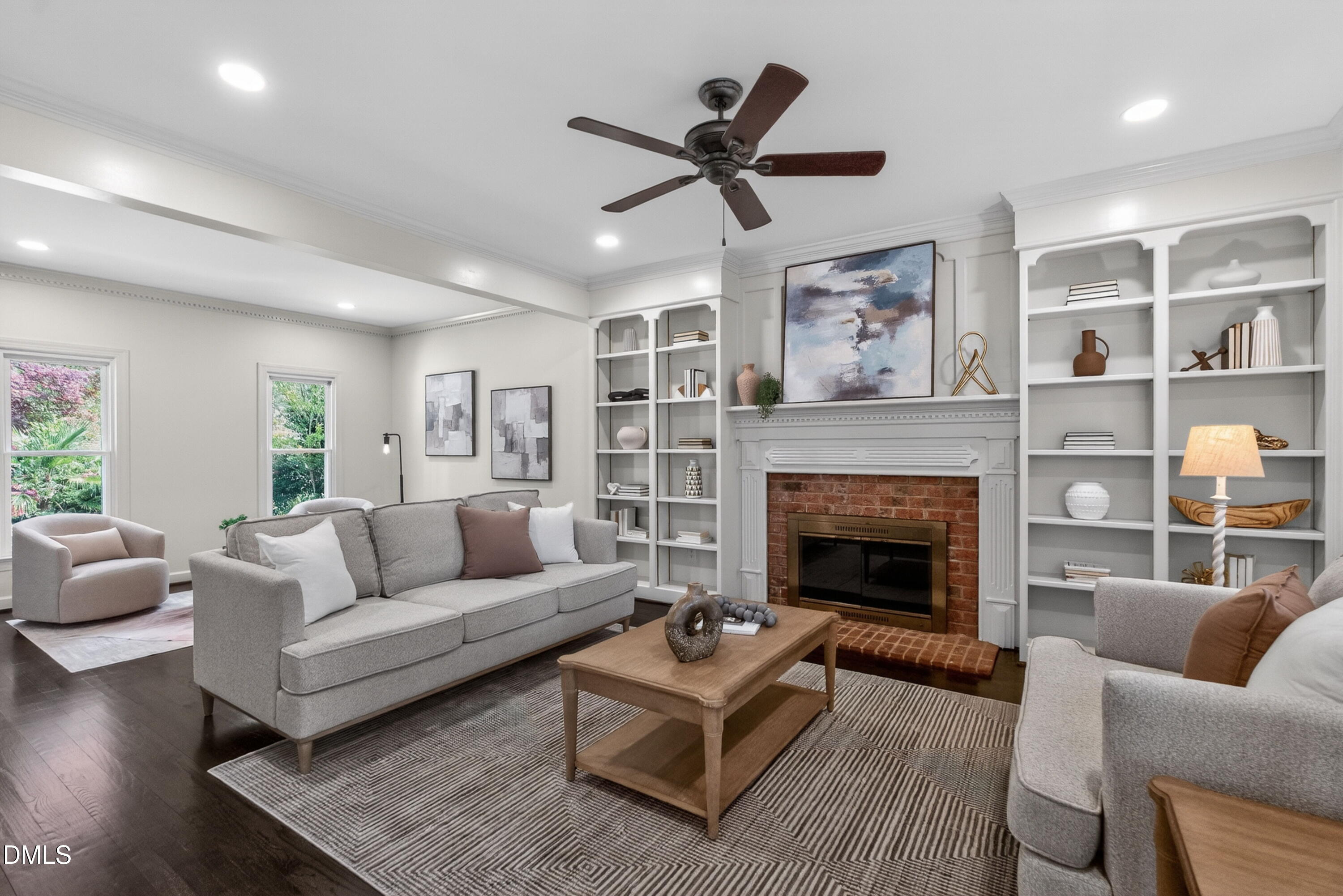 4021 Westwood Place Raleigh, NC 27613 - Photo 8 of 37 a living room with furniture and a fireplace