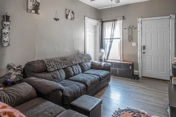 a living room with furniture and a window