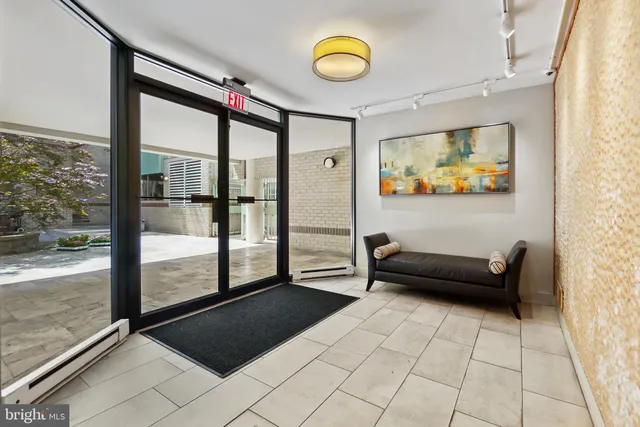 a view of a livingroom with furniture and window