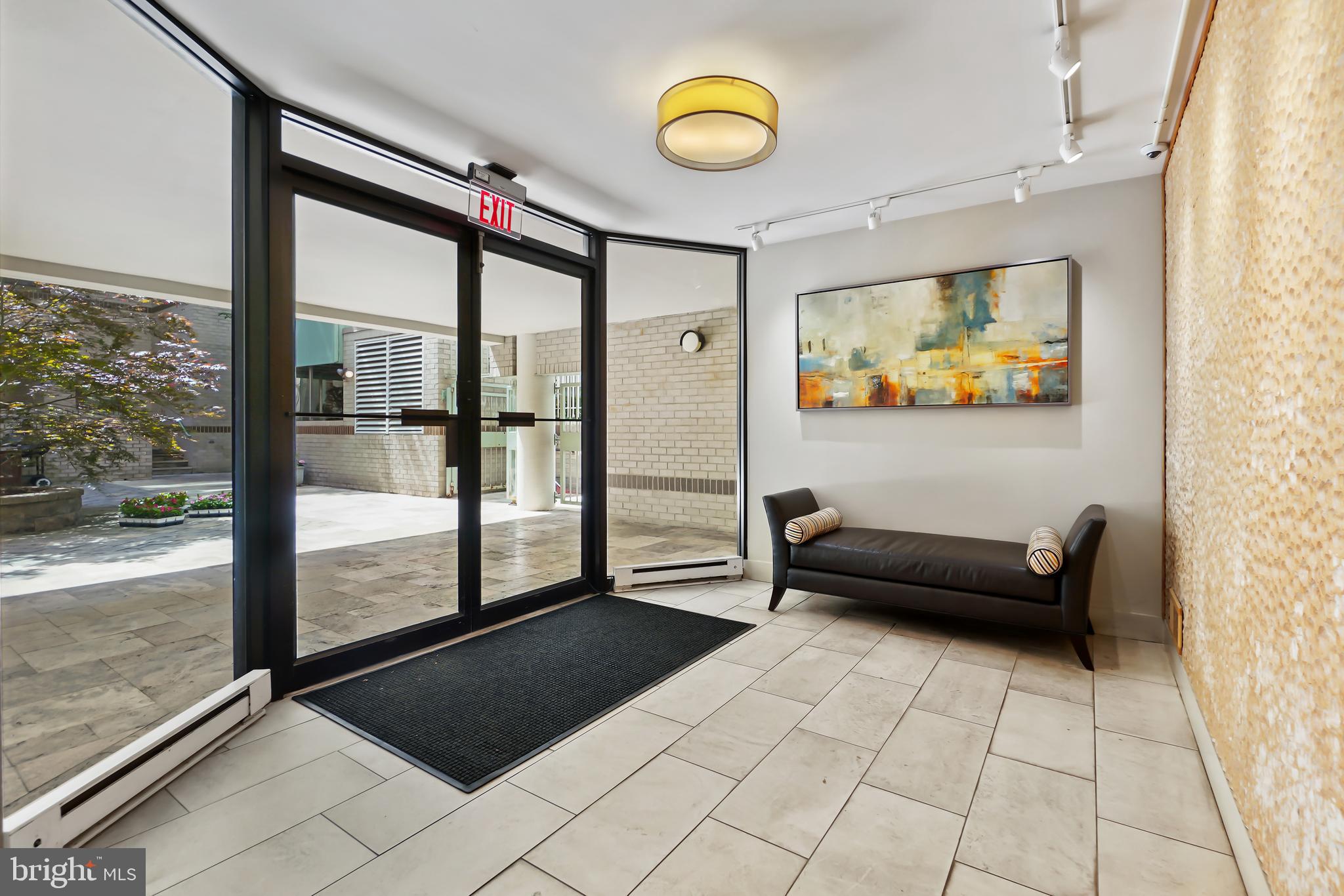 2141 Wisconsin Avenue Northwest, Unit 103 Washington, DC 20007 - Photo 3 of 30 a view of a livingroom with furniture and window