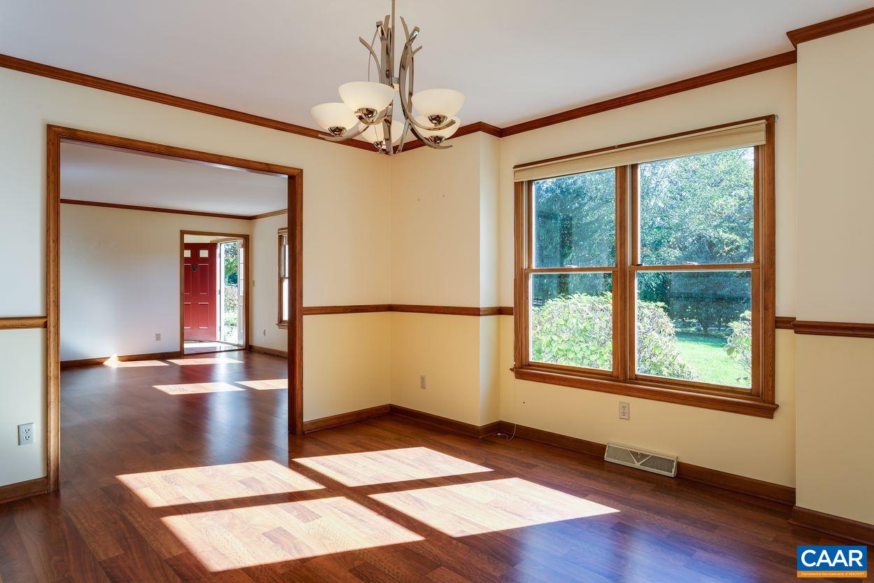 5904 Free Union Road Free Union, VA 22940 - Photo 14 of 75 a view of an empty room with wooden floor and a window